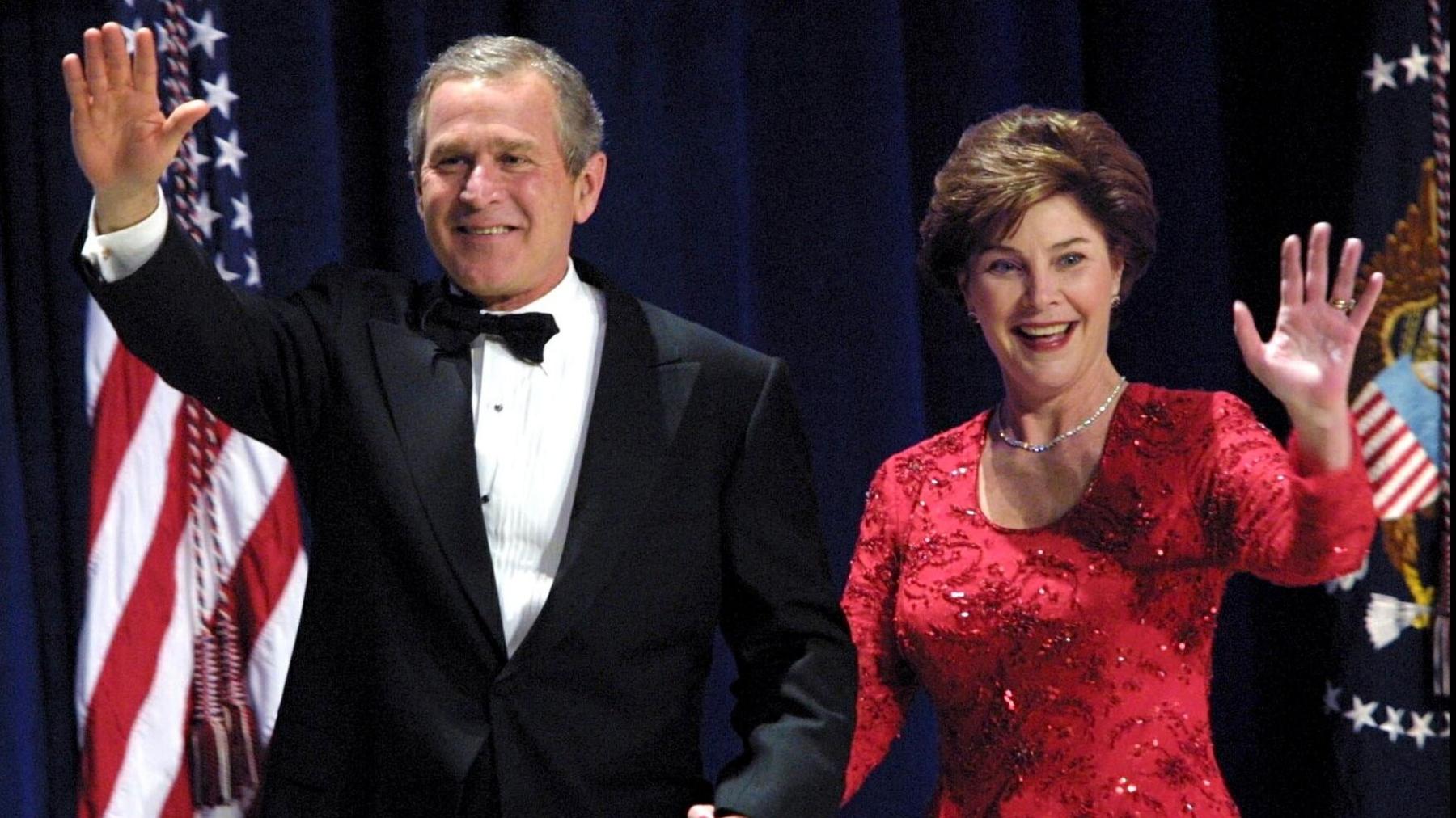 G.W. Bush and Laura Bush at the Florida Inauguration Ball in Washington, United States on January 20, 2001. Mrs Bush wears a glittering red dress.