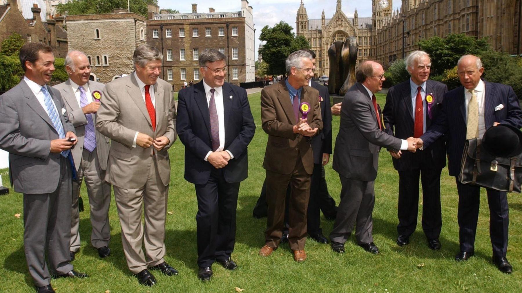 UKIP MEPs lined up outside the Houses of Parliament in 2004, including Nigel Farage and Jeffrey Titford, as well as Graham Booth, Roger Knapman, John Whittaker, Gerard Batten, Ashley Moate, Derek Clark and Godfrey Bloom