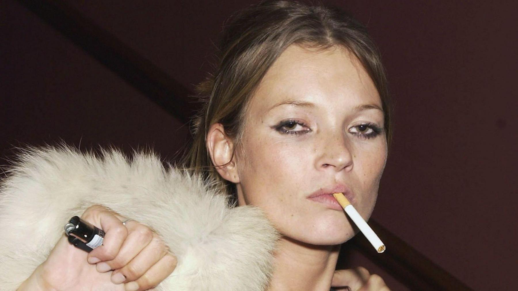 Kate Moss smoking a cigarette 