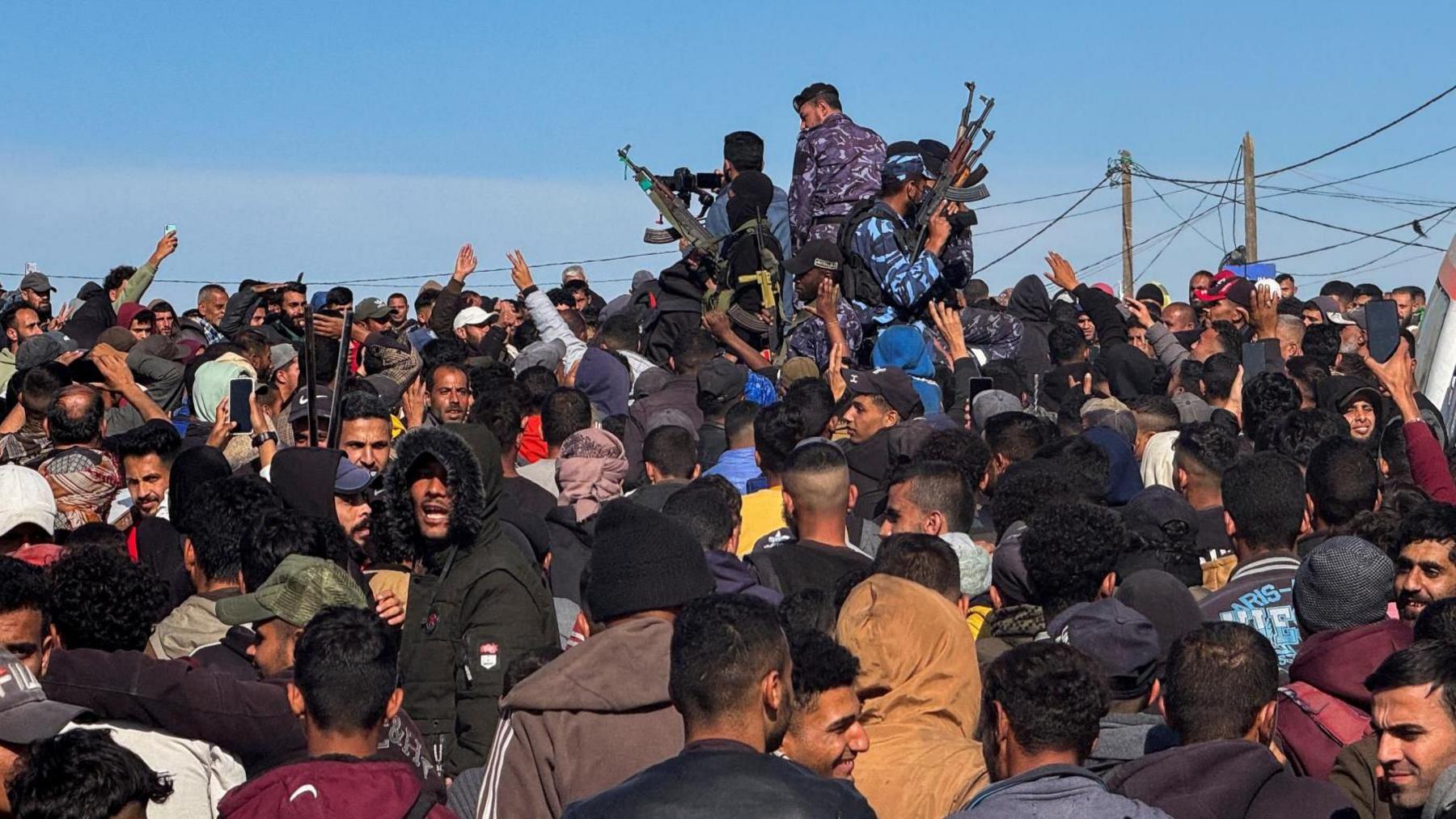 Crowds and Hamas police officers in Gaza