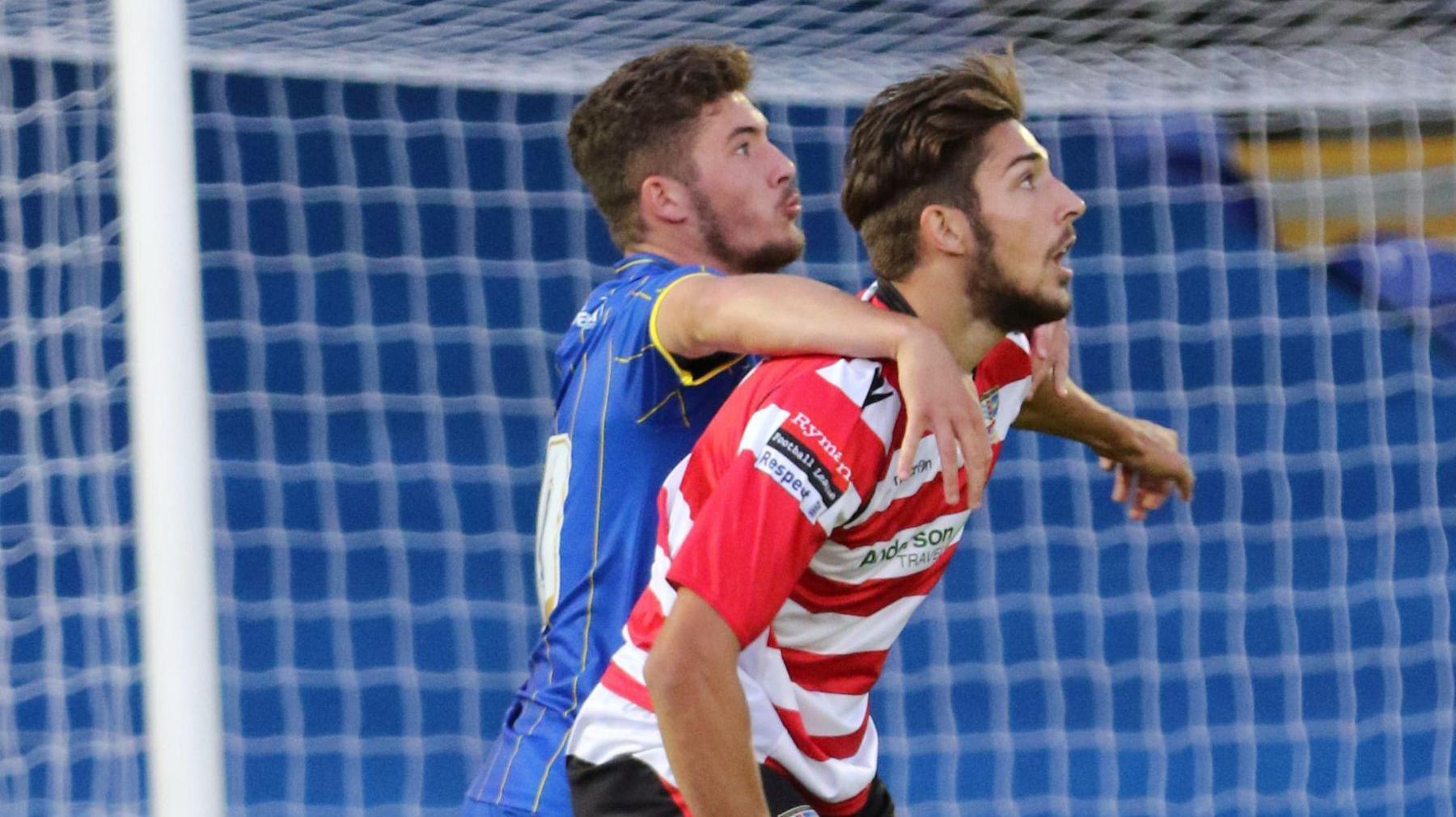 Ryan Sweeny and Dan Sweeney playing against each other in a pre-season friendly in July 2015