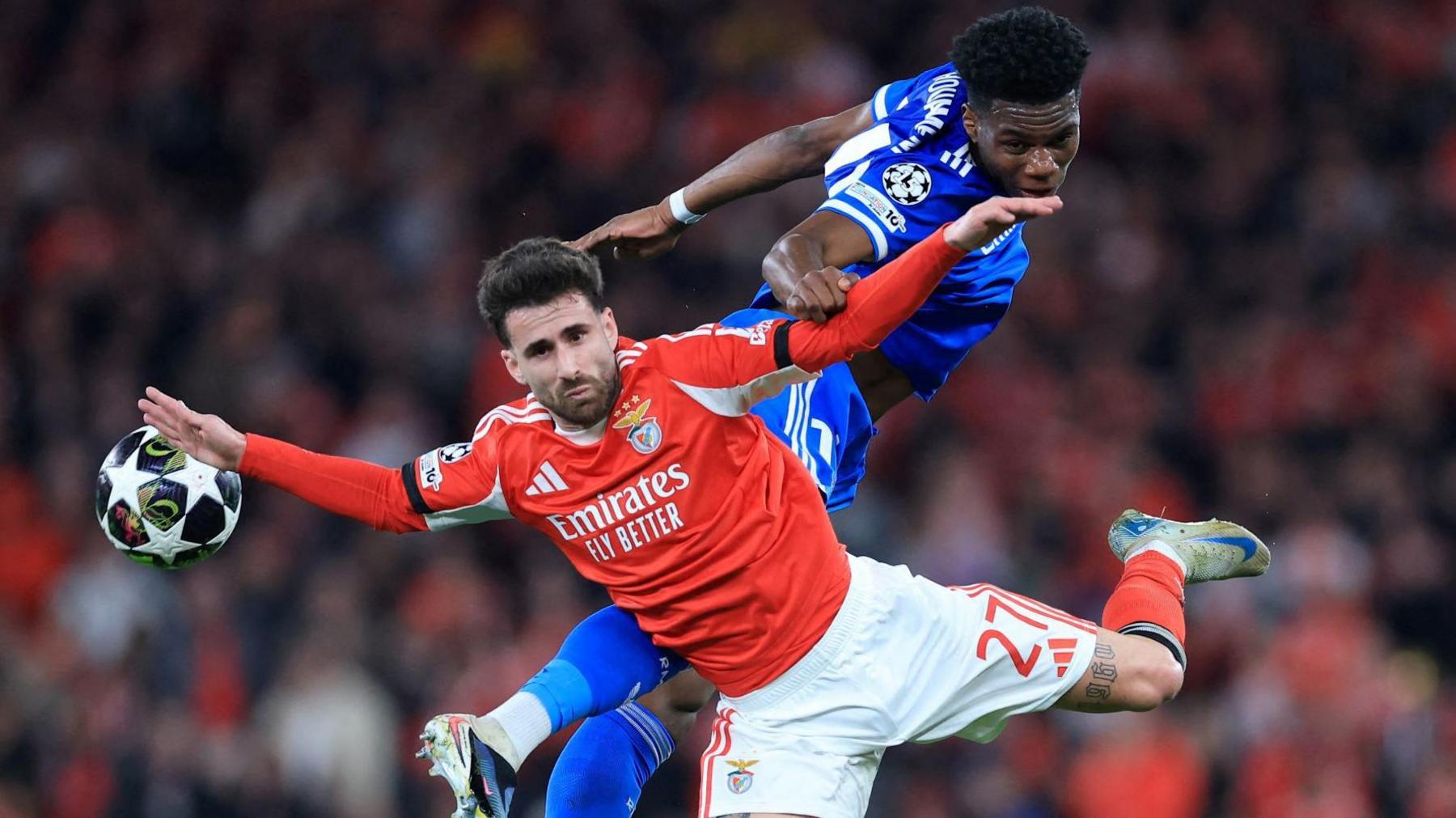 Benfica's Rafa Fernandes battles for the ball with Real Madrid's French midfielder Aurelien Tchouameni