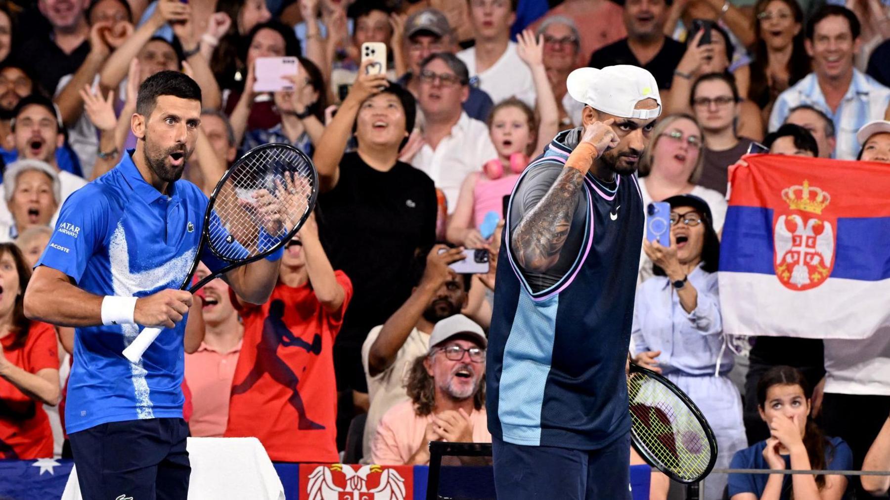 Novak Djokovic and Nick Kyrgios celebrate at the Brisbane International