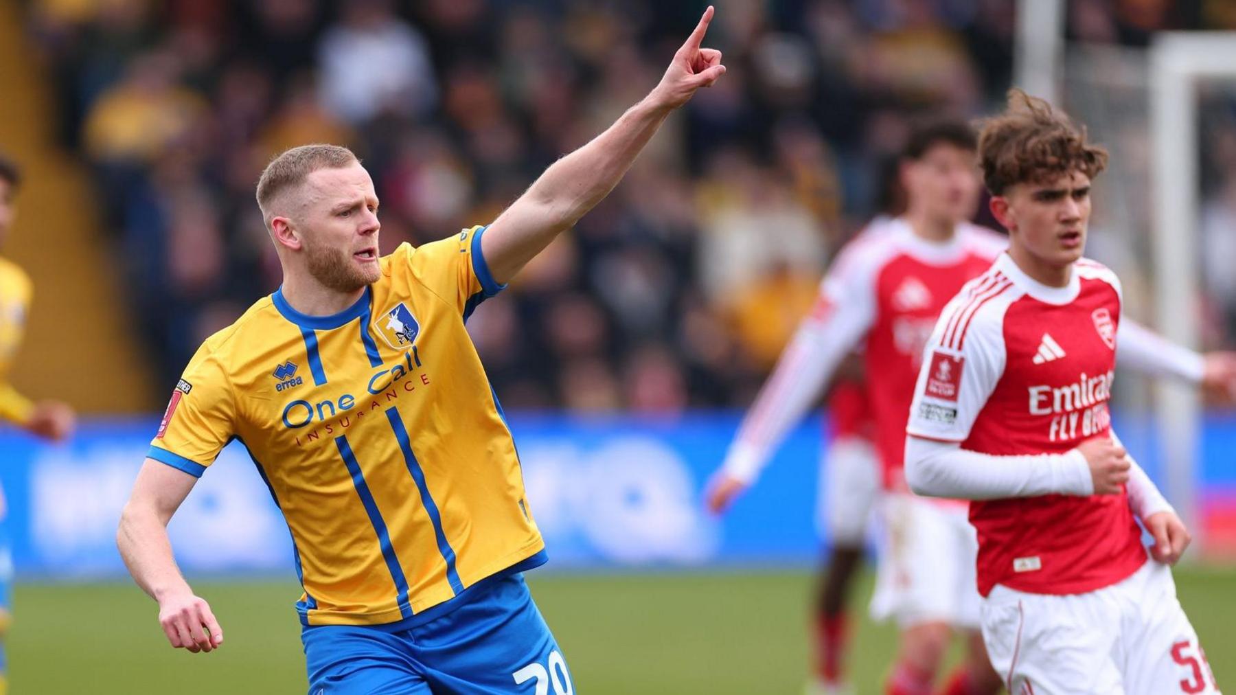 Frazer Blake-Tracy in action for Mansfield against Arsenal