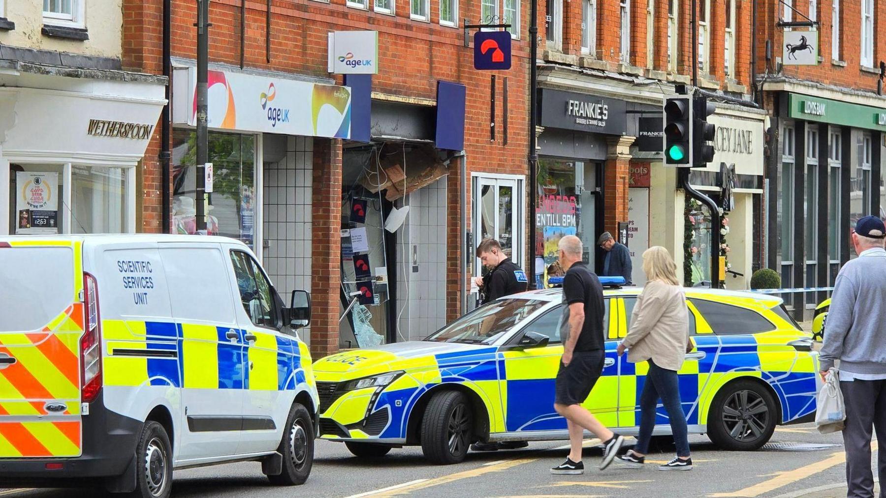 Police cars outside the Nationwide Building Society in Biggleswade