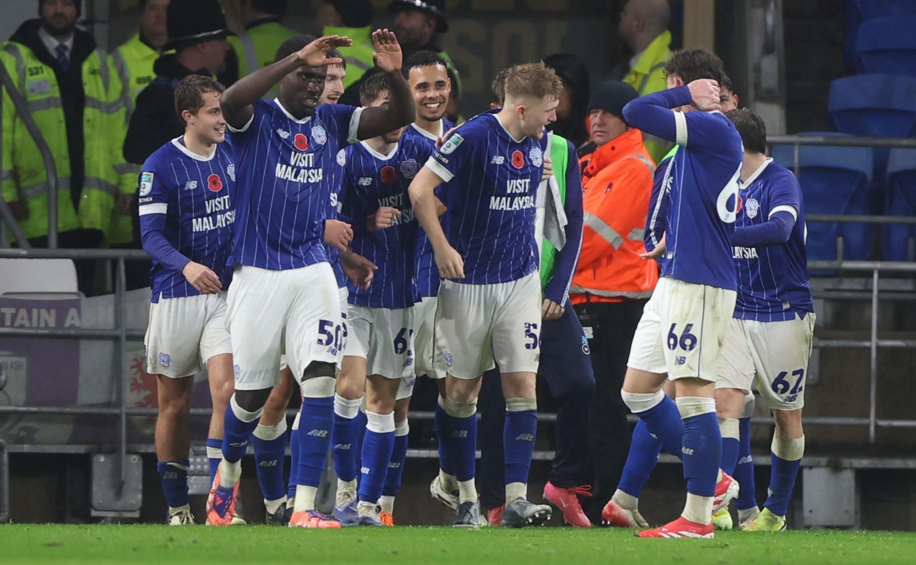 Cardiff players celebrate