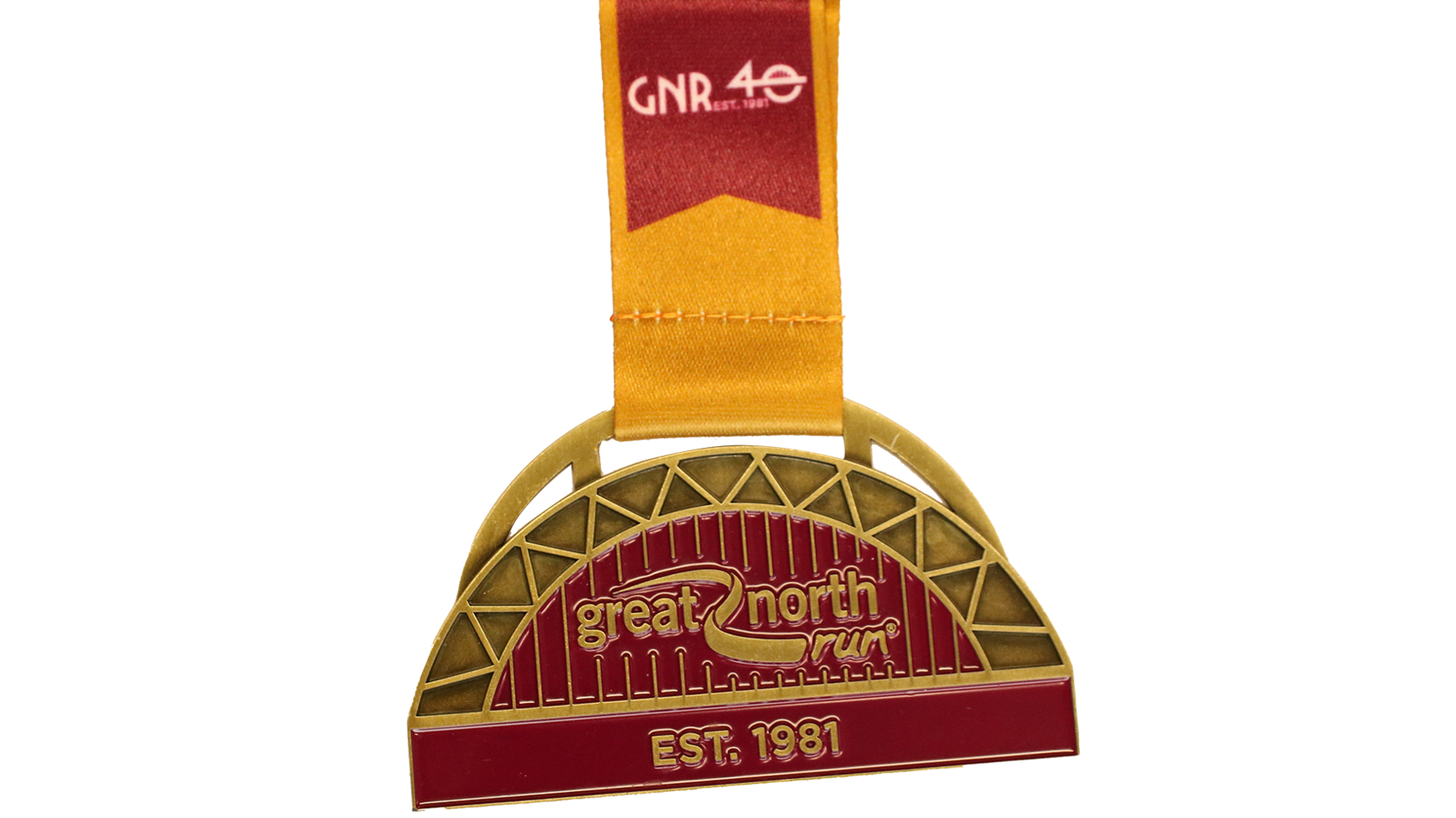 A medal in the shape of a half circle. It is gold and read and reads 'great north run, est.1981' and shows the Tyne bridge. 