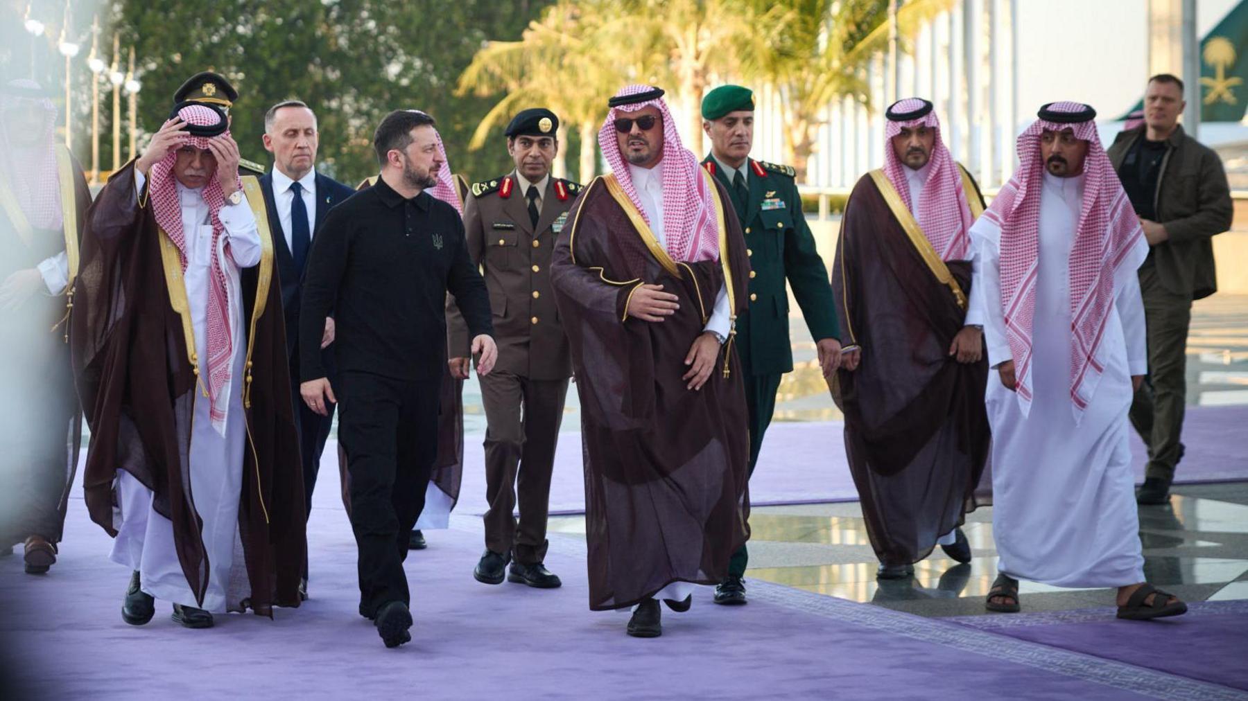 Ukraine's President Volodymyr Zelensky arrives in Saudi Arabia, Jeddah flanked by Deputy Governor of Makkah Region Prince Saud bin Mishal bin Abdulaziz and other officials