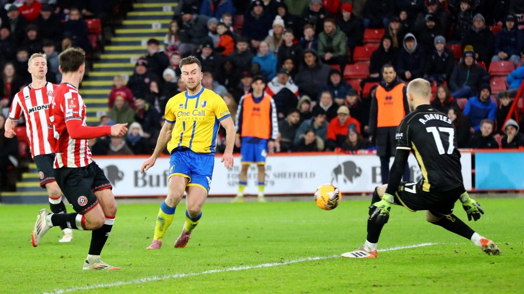 Rhys Oates scoring for Mansfield Town