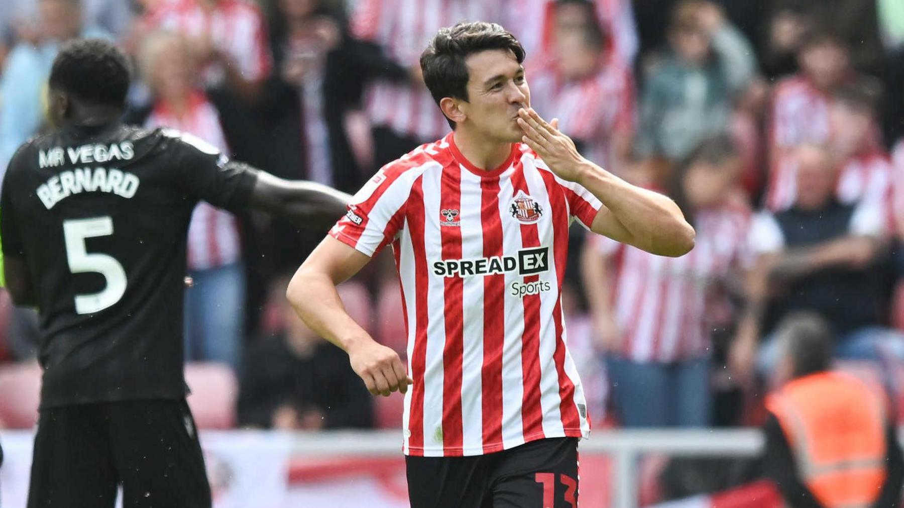 Luke O'Nien blows a kiss to the Sunderland fans after scoring the club's third goal against Sheffield Wednesday