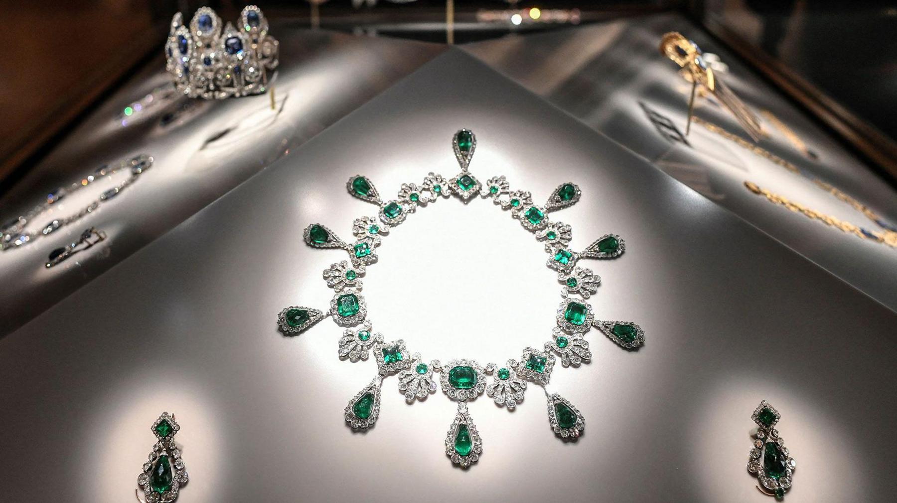 A silver necklace with green jewels stolen during the Louvre heist