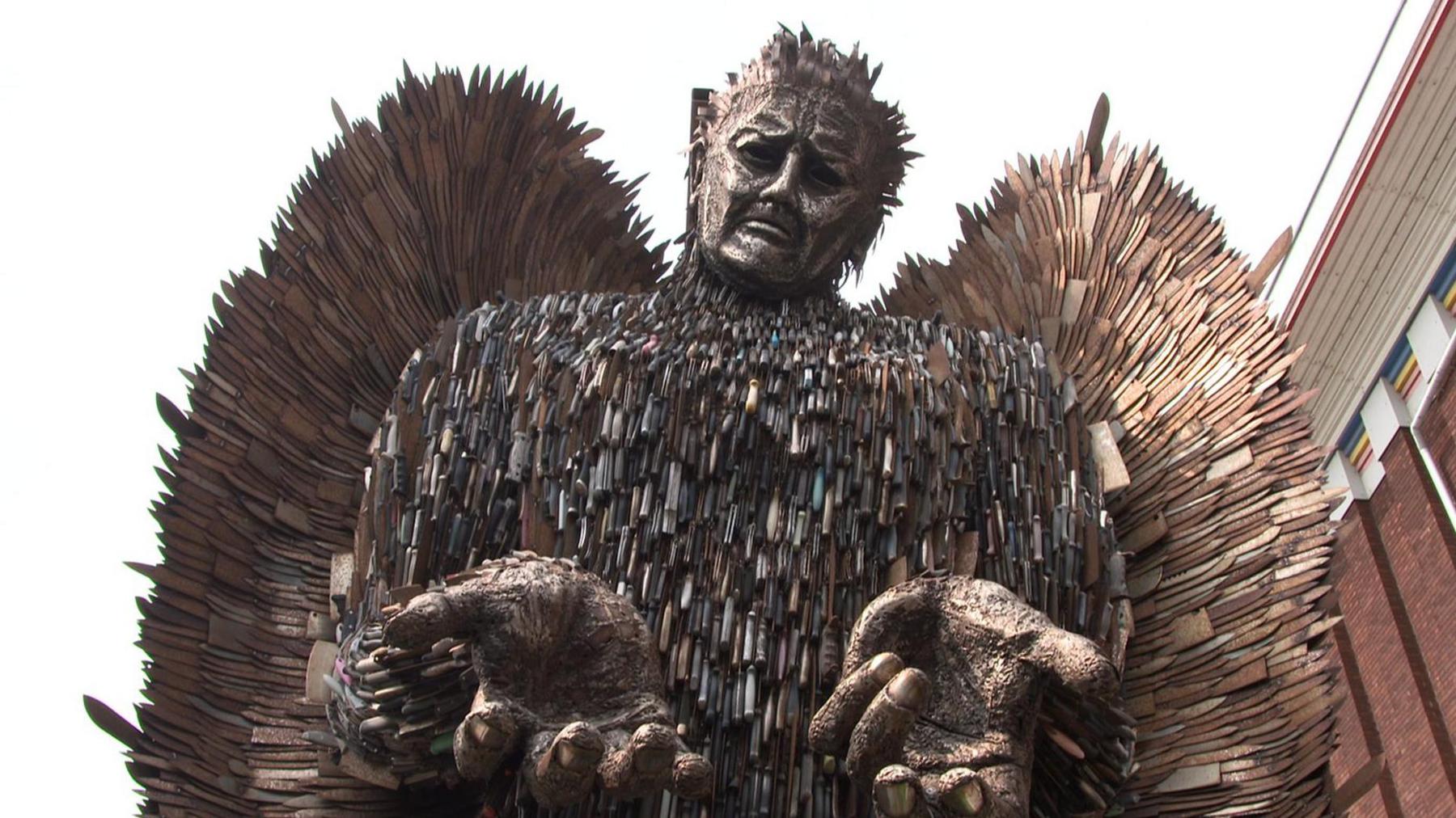 The knife angel. A 27ft-tall (8m) metal sculpture in the shape of an angel with its hands held out, made from 100,000 blades.