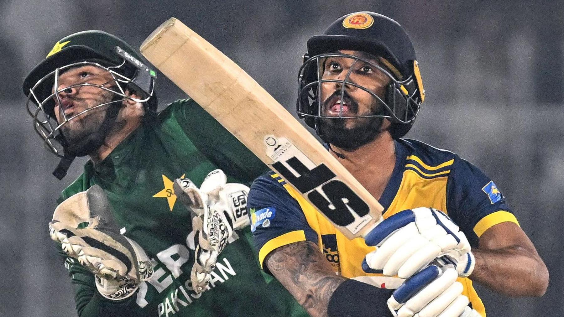 Pakistan wicketkeeper Usman Khan and Sri Lanka batter Kamil Mishara during a Twenty20 international in 2025