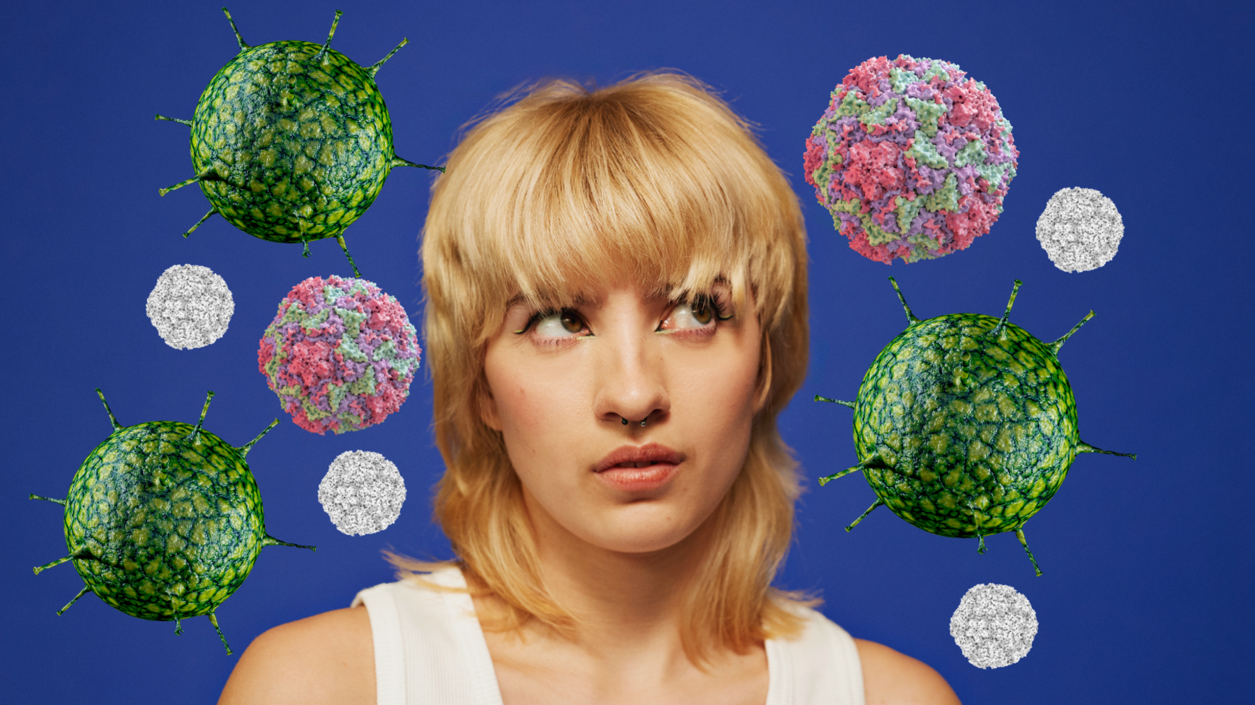A person with blonde hair, dressed in a white top, stands against a blue backdrop. Surrounding them are floating, orb-like structures resembling virus particles.