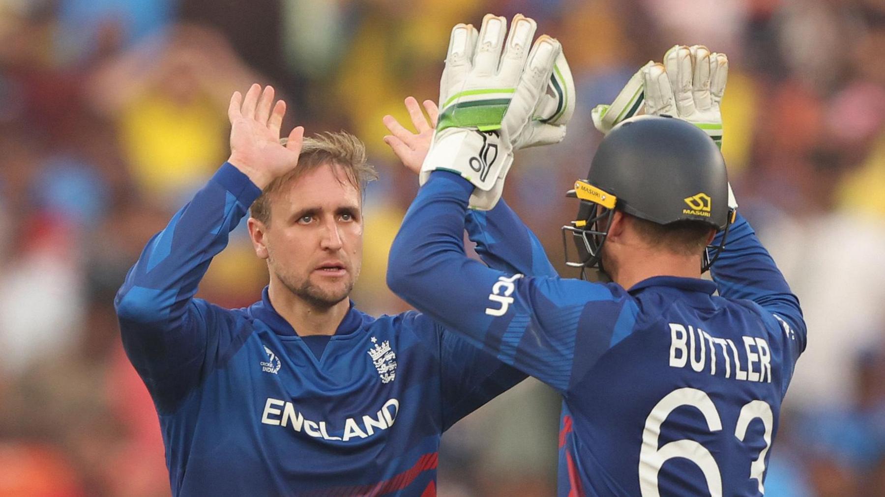 Liam Livingstone high-fives Jos Buttler