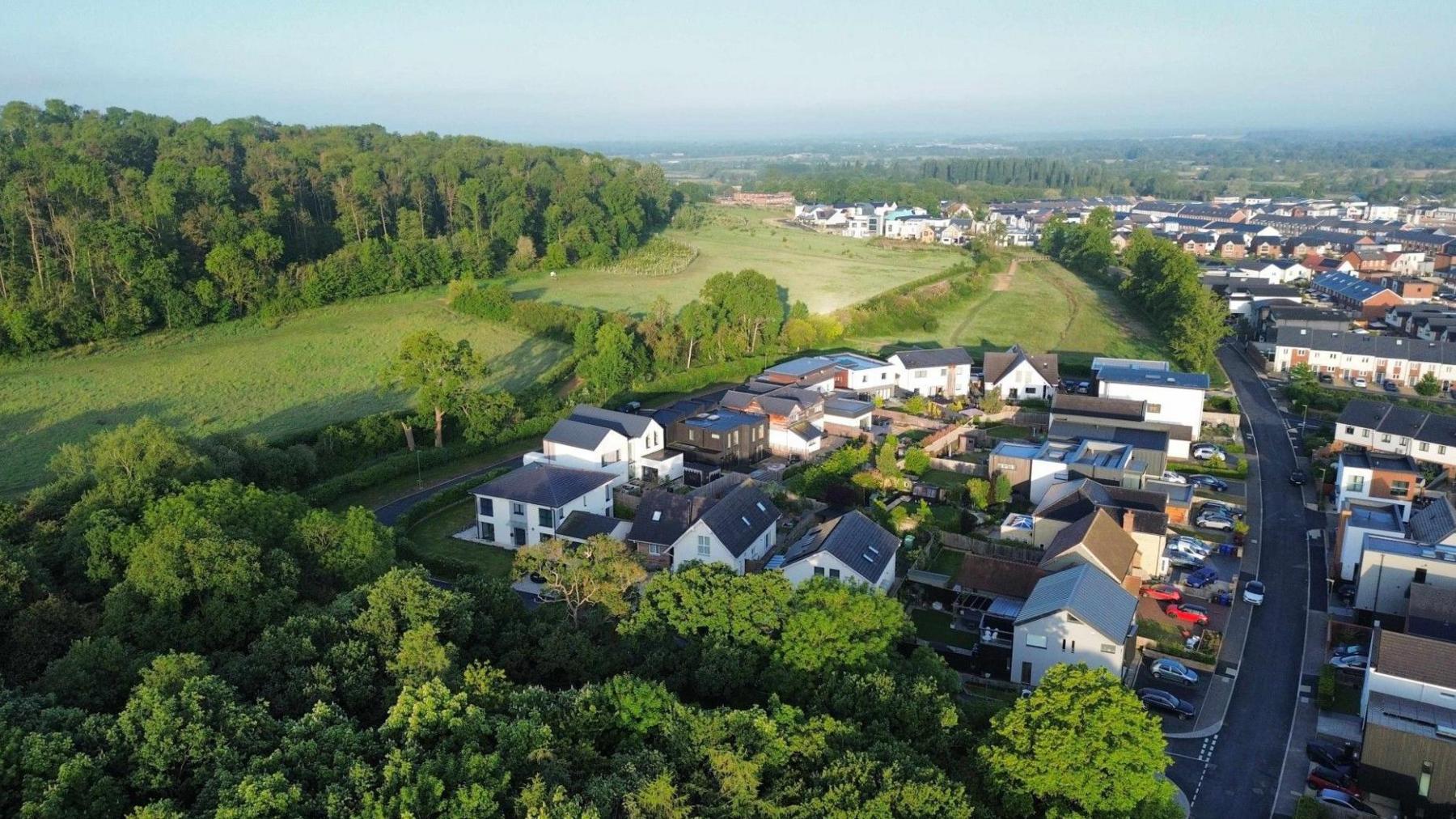 Another angle of Graven Hill from the air, the settlement bordered on the left with fields and trees.