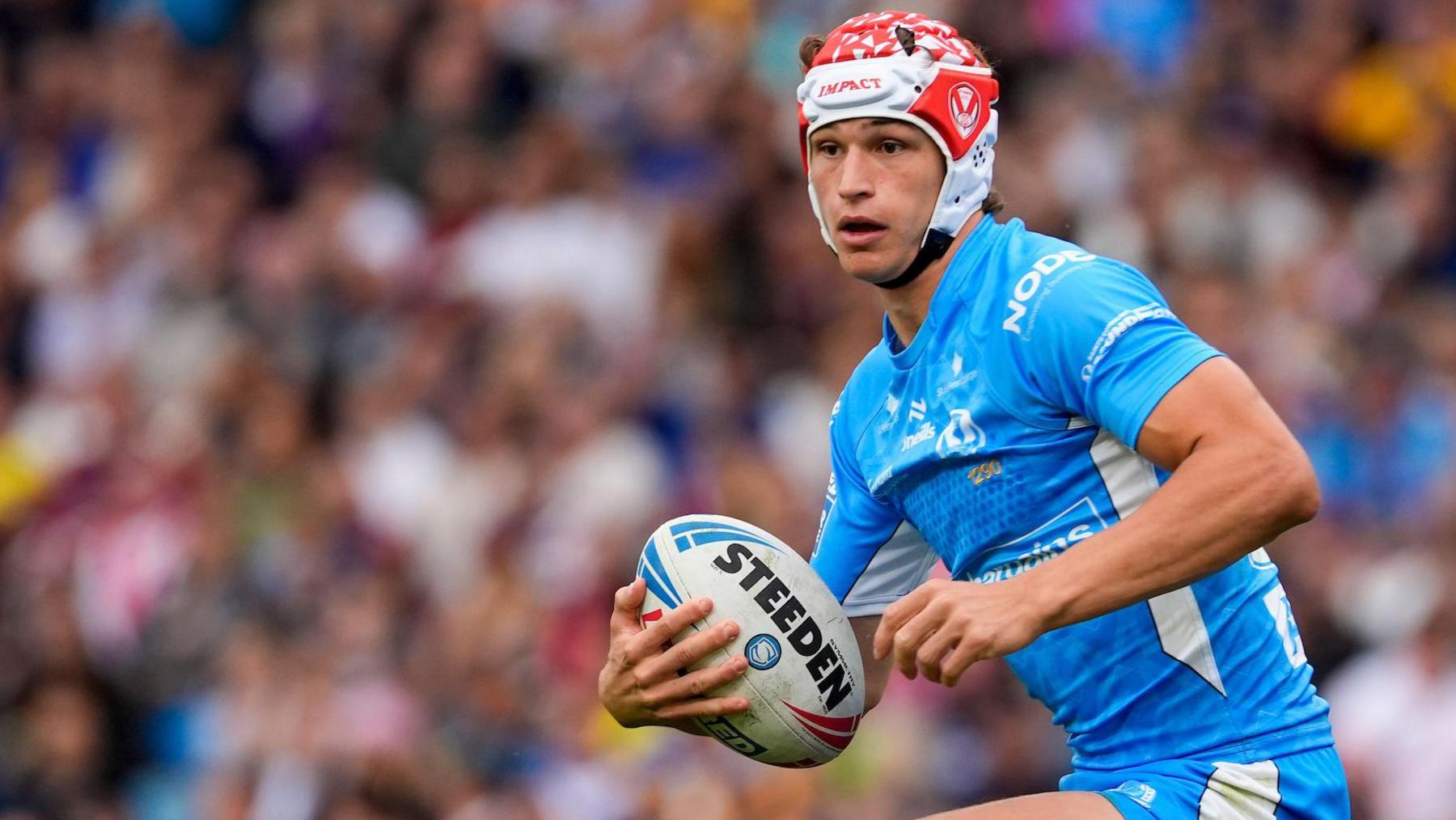 Harry Robertson playing for St Helens in 2024 (in a St Helens away kit)