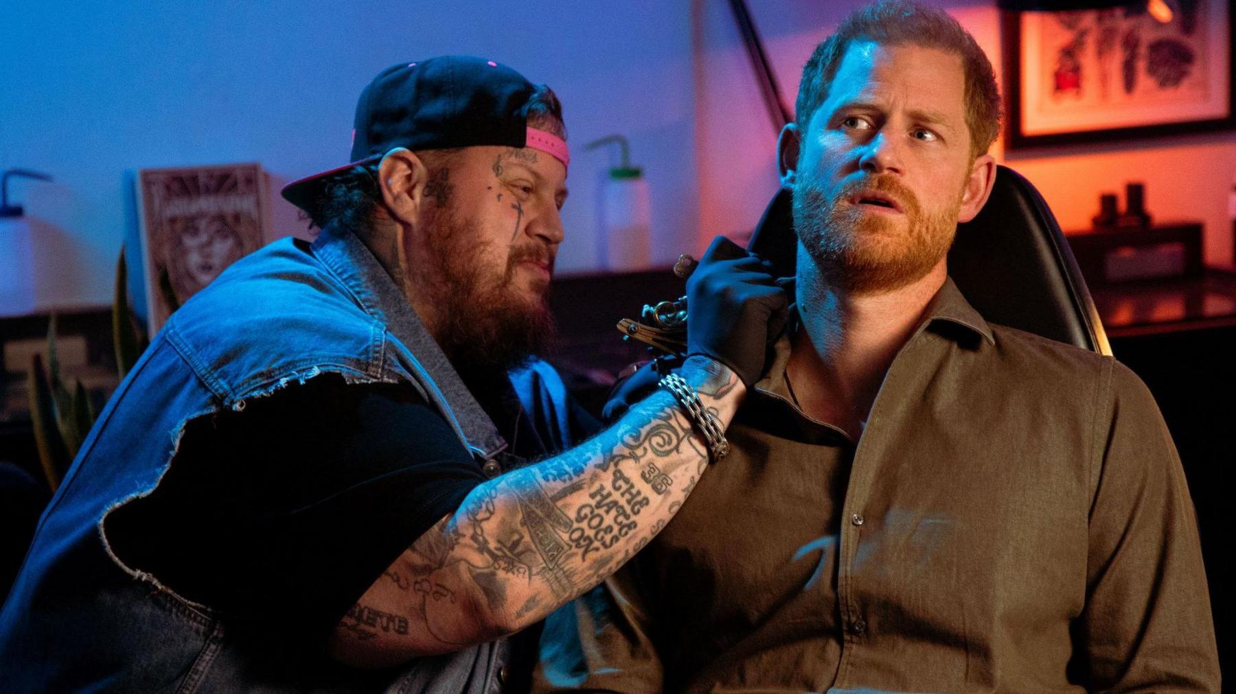 Singer Jelly Roll in a comedy sketch about giving Prince Harry a tattoo