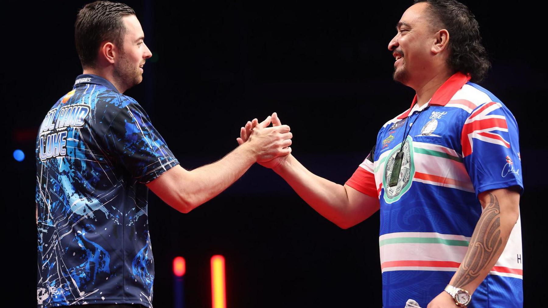 Luke Humphries and Haupai Puha shake hands