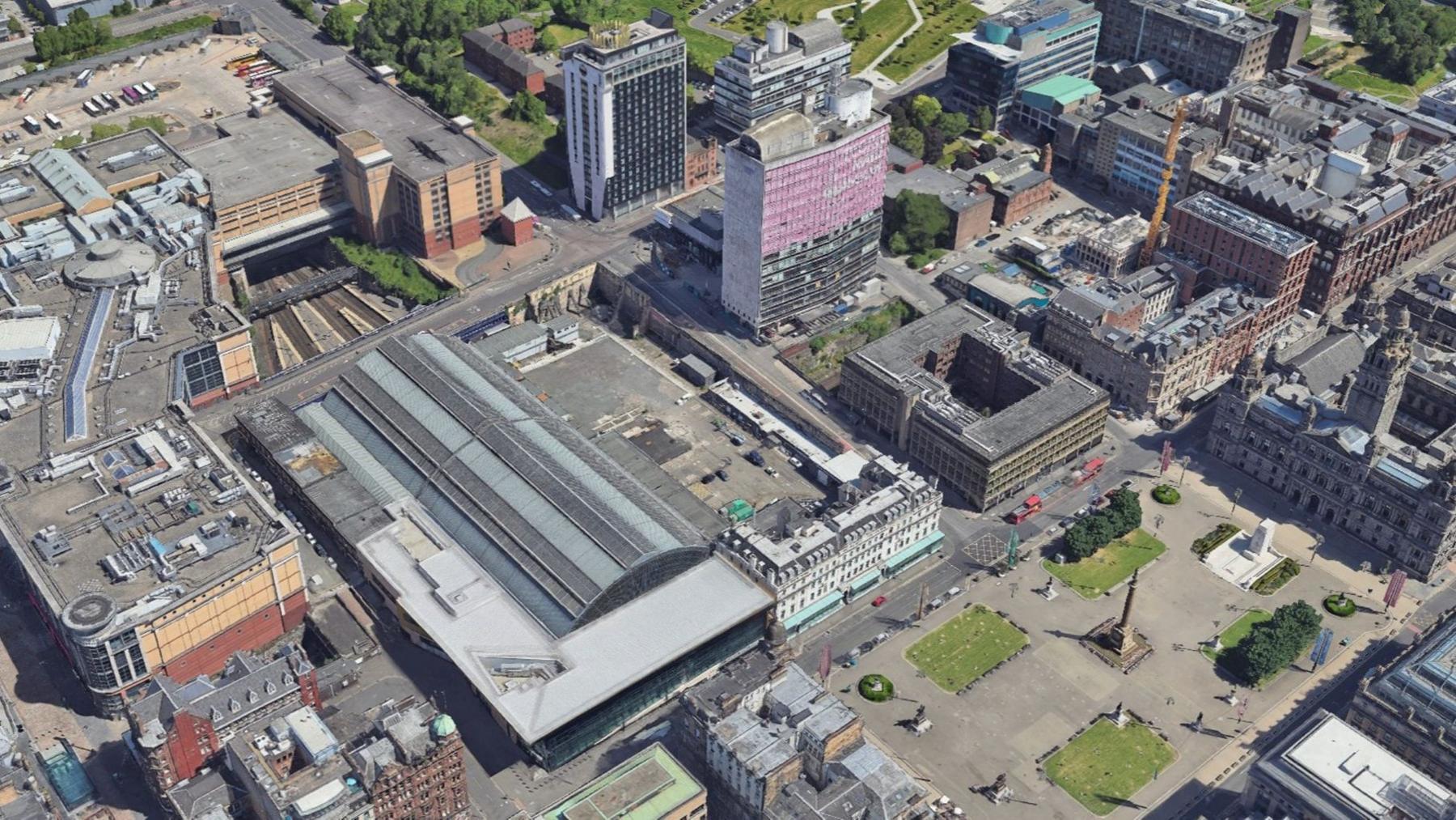 An aerial view of George Square, Glasgow Queen Street train station and North Hanover Street. Disused land is next to the station.