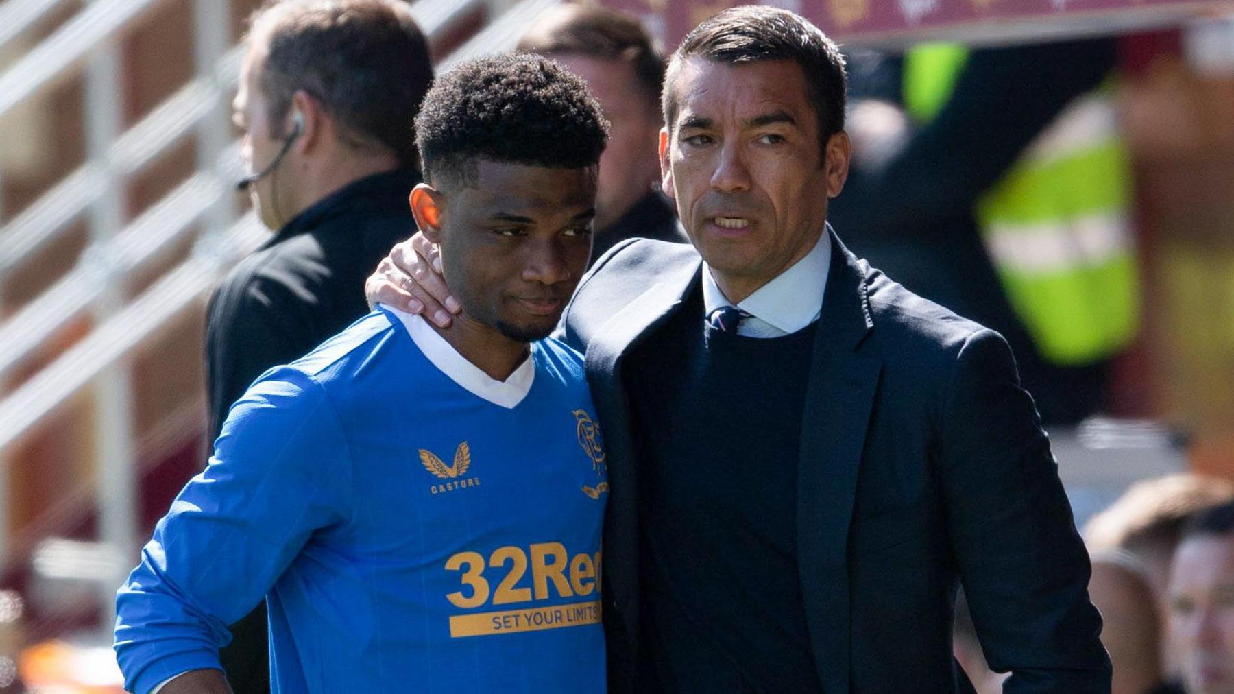 Amad Diallo consoled by Rangers manager Giovanni van Bronckhorst