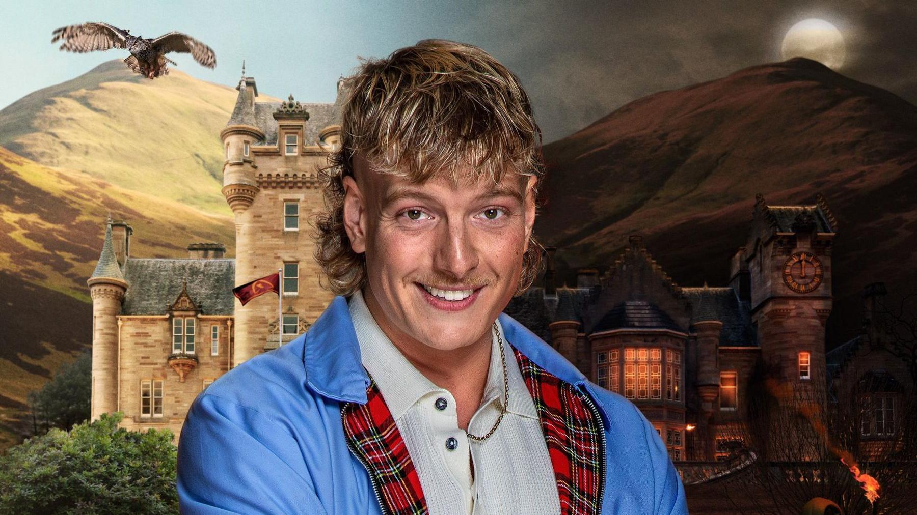 A man with a blonde mullet wearing a grey polo shirt and a blue jacket with a tartan lining. Behind him a background shows a castle in the Scottish highlands.