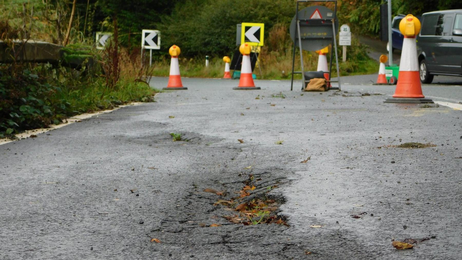 Damaged road surface on Snake Pass