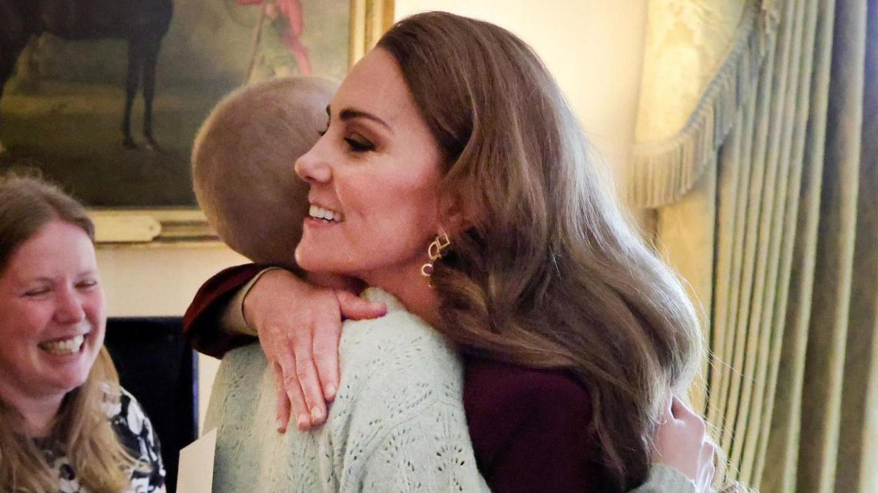 A close up of a smiling Princess of Wales hugging Liz Hatton.