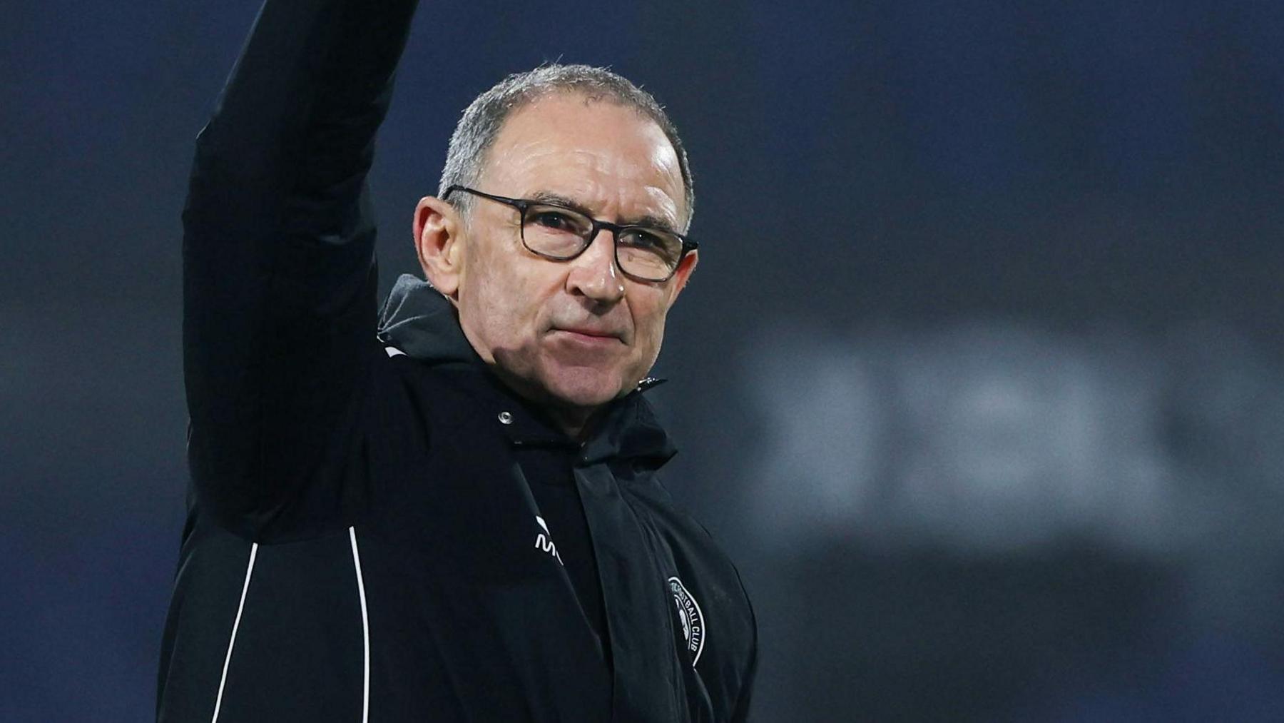 Martin O'Neill waves to Celtic fans astatine full-time