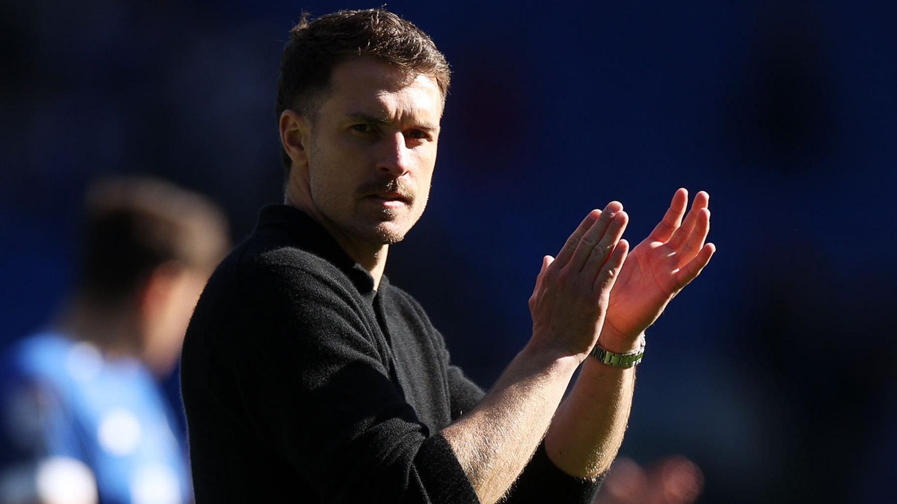 Aaron Ramsey applauds Cardiff fans after the 1-1 draw with Oxford United