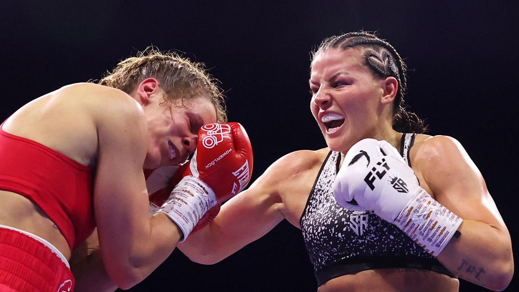  Terri Harper is punched by Sandy Ryan during the WBO World welterweight title fight 