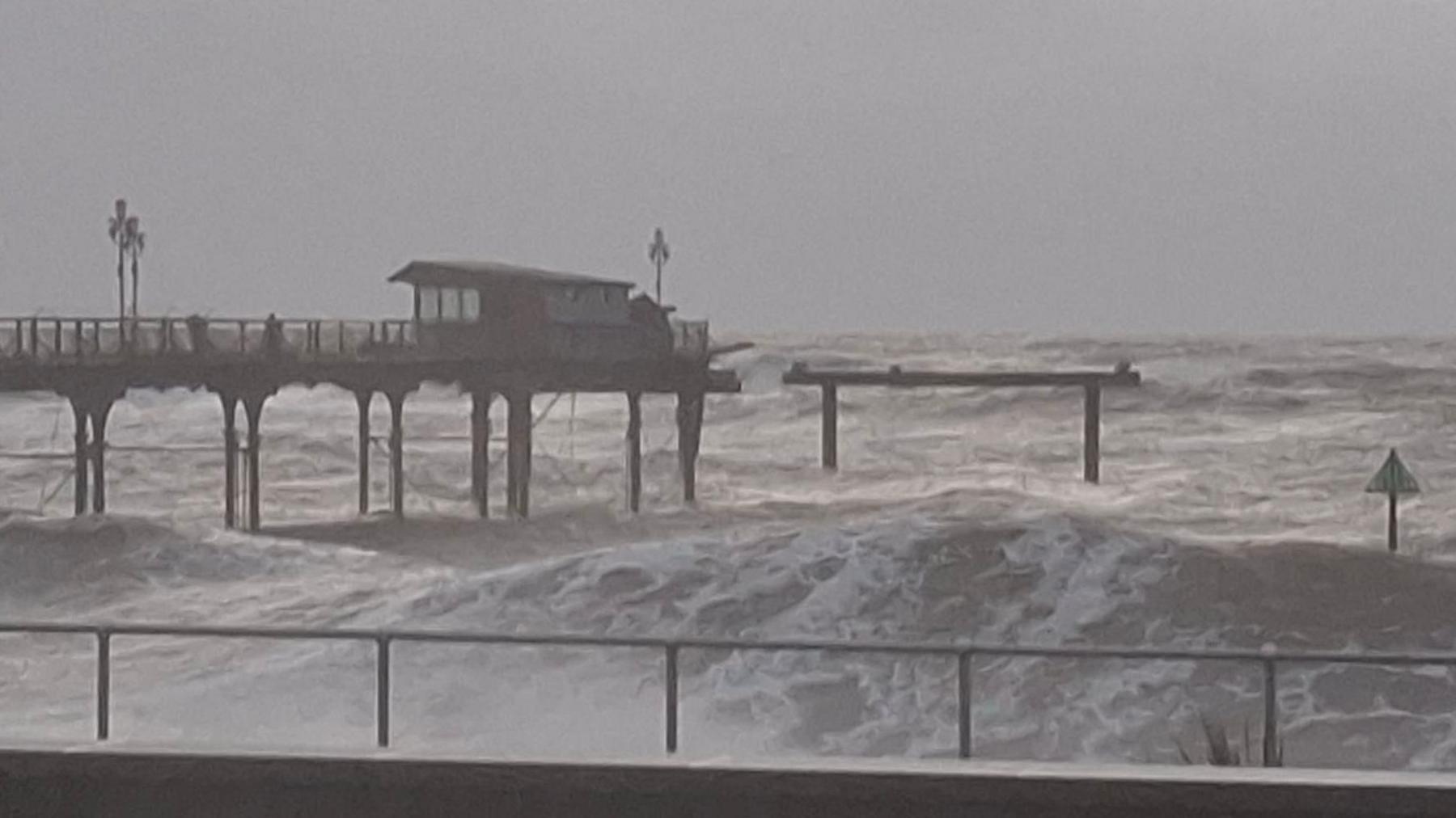 Part of the historic Teignmouth Grand Pier structure has collapsed into the sea after being washed away by powerful storm waves during Storm Ingrid.