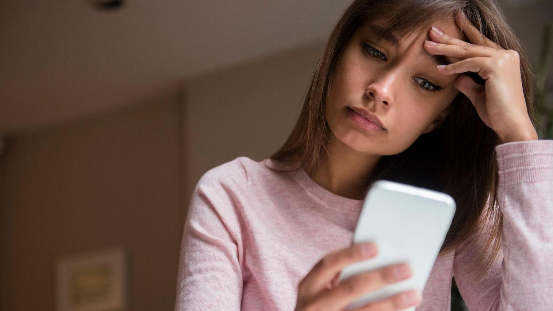 Woman looking at phone