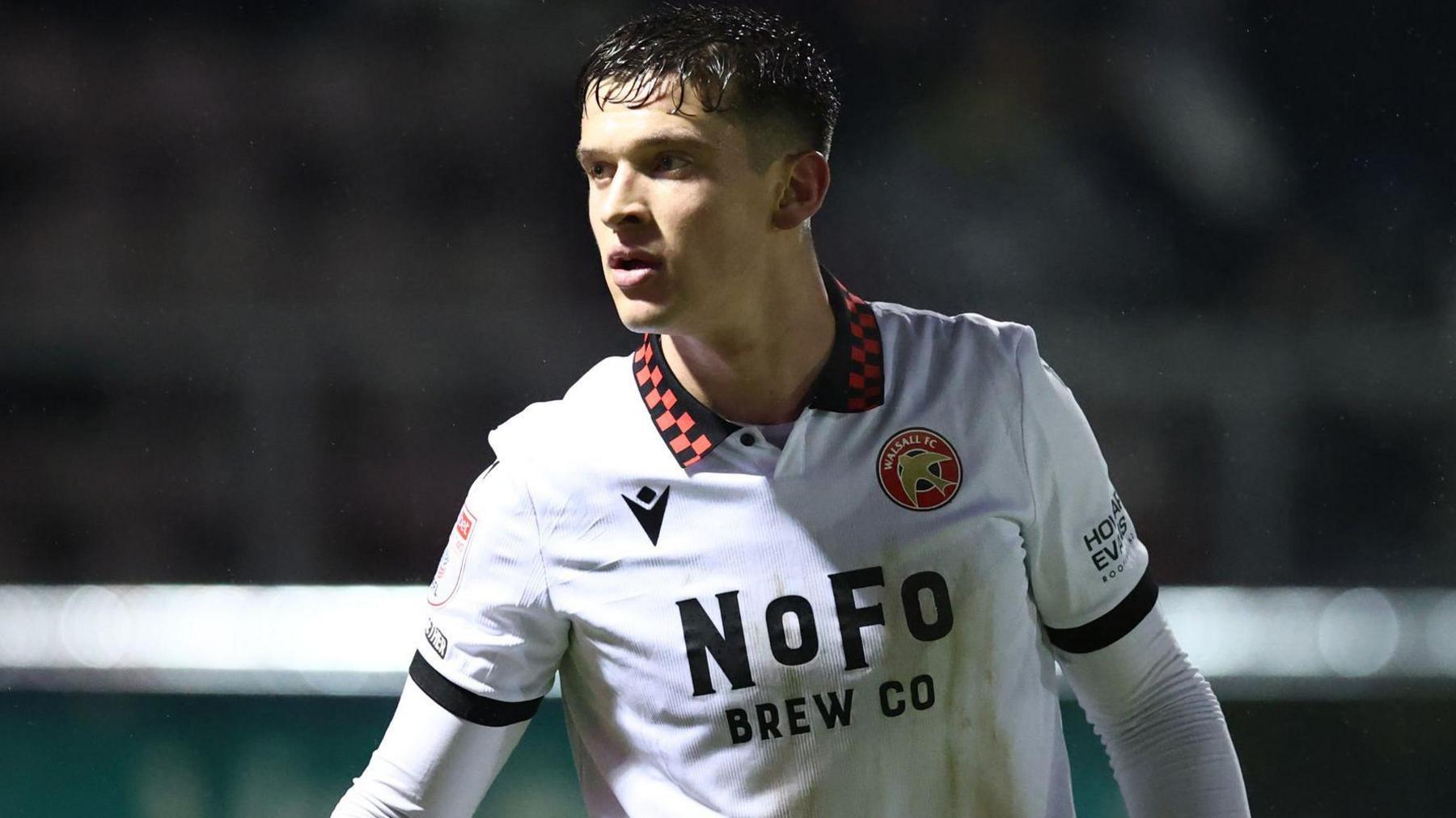 Harrison Burke in Walsall's white change strip