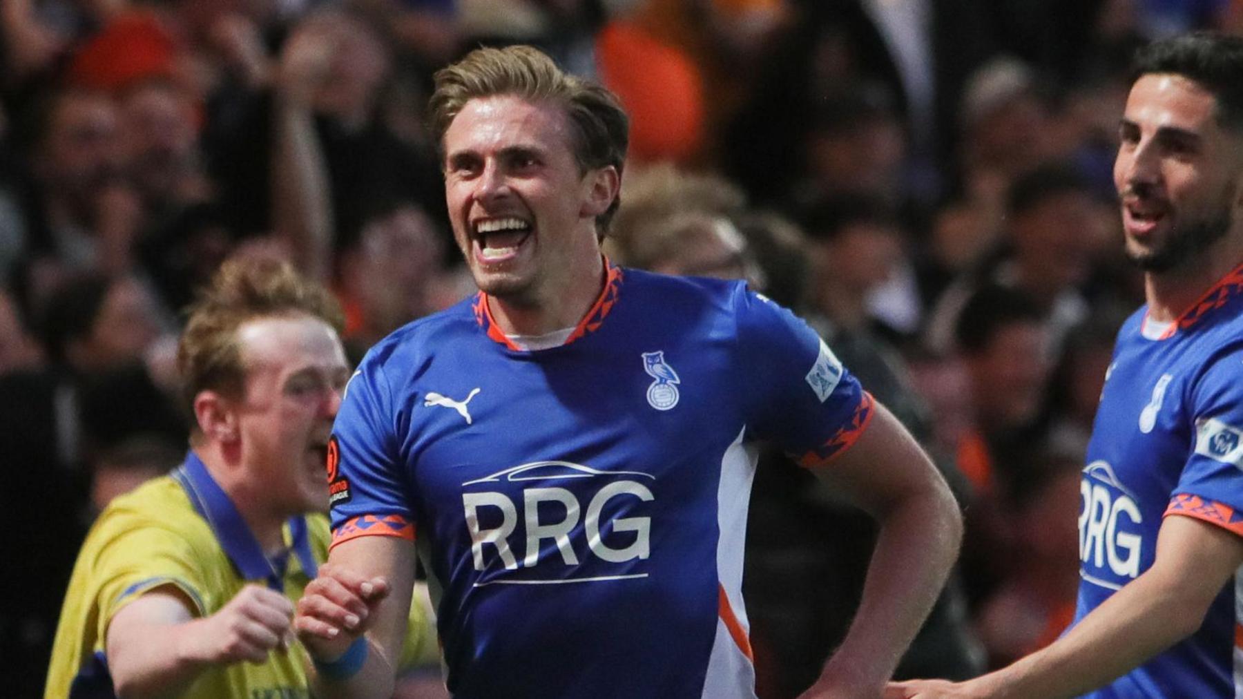 Joe Pritchard celebrates scoring for Oldham against York