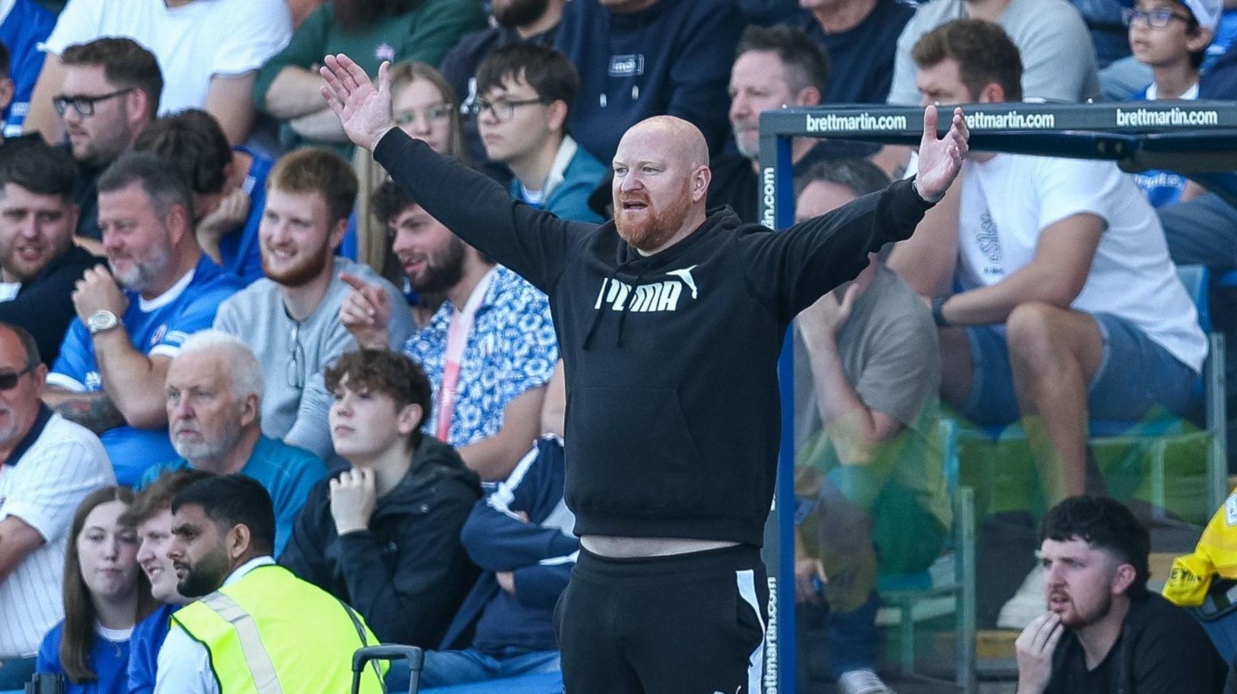 Andy Whing in the dugout for Barrow