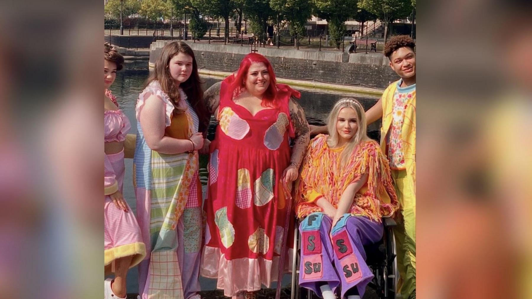 Five models standing together wearing Ms Gauntlett's designs.