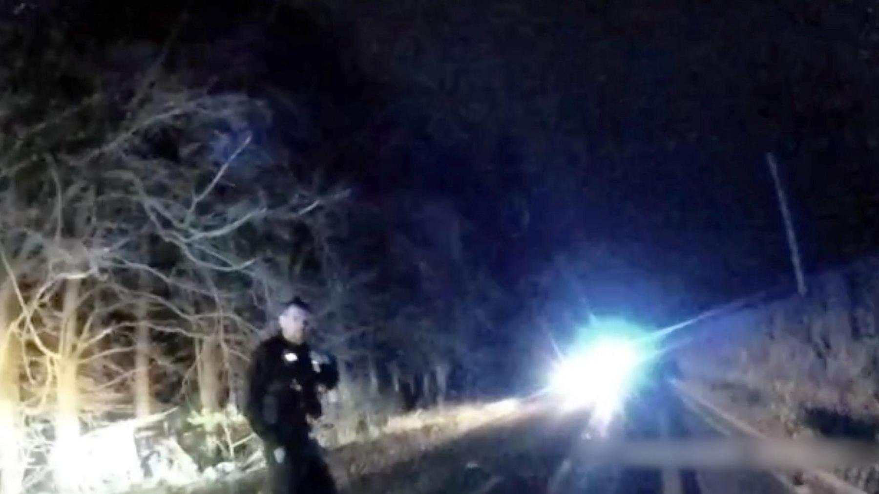 A police officer at the scene of the crash