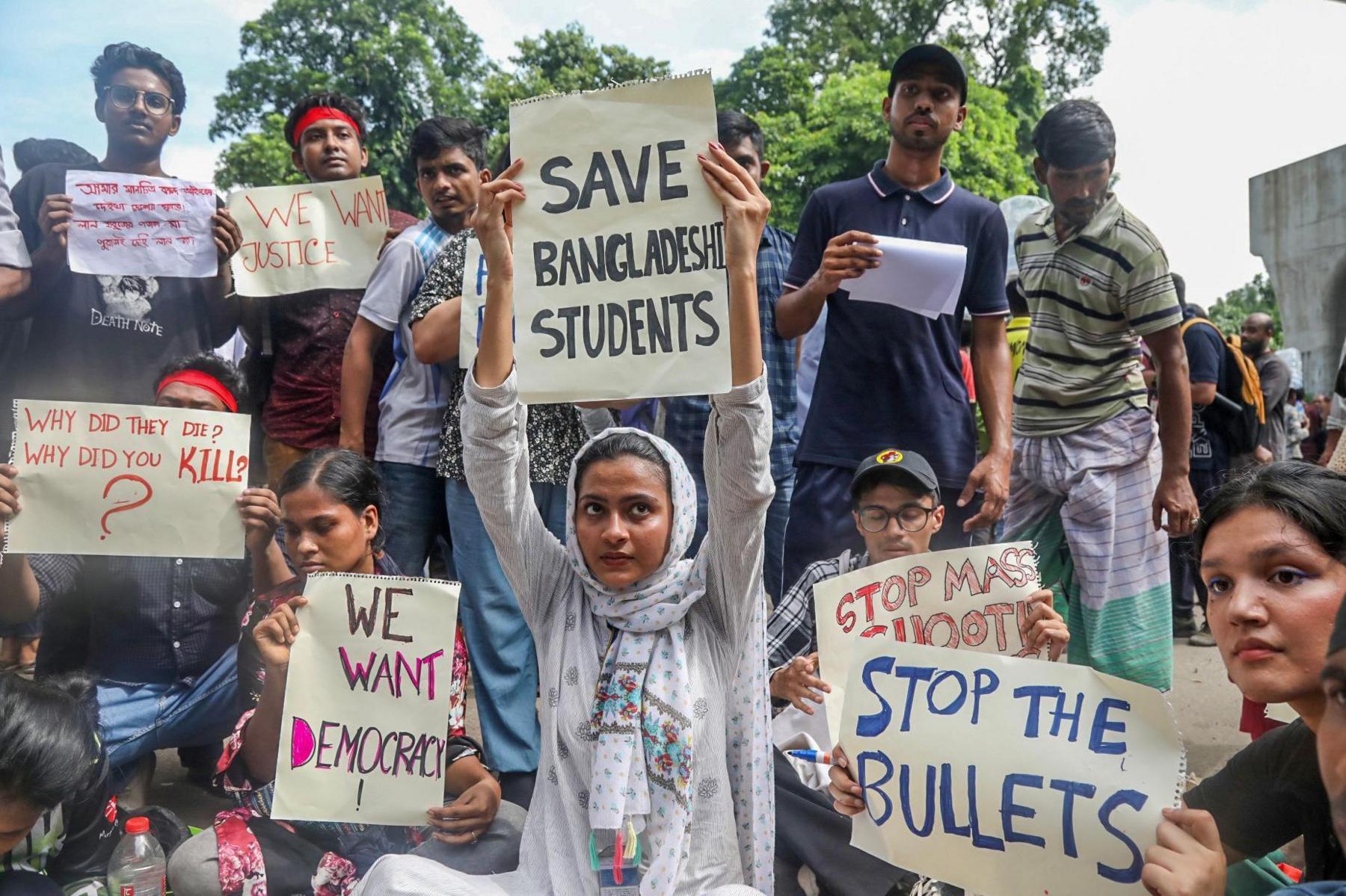 Protesters hold up placards during a 'March for Justice' in front of the Supreme Court area in Dhaka, Bangladesh, 31 July 2024. A nationwide 'March for Justice' was called on 31 July by the Students Against Discrimination group, which has led the quota reform protests, in courts, campuses and on the streets to protest against the 'killings, attacks, and enforced disappearances', and to demand an investigation by the United Nations into the violence that occurred during the student-led protests against the government's job quota system, according to the group's coordinator. Anti-quota protesters call for nationwide 'March for Justice' in Bangladesh, Dhaka - 31 Jul 202