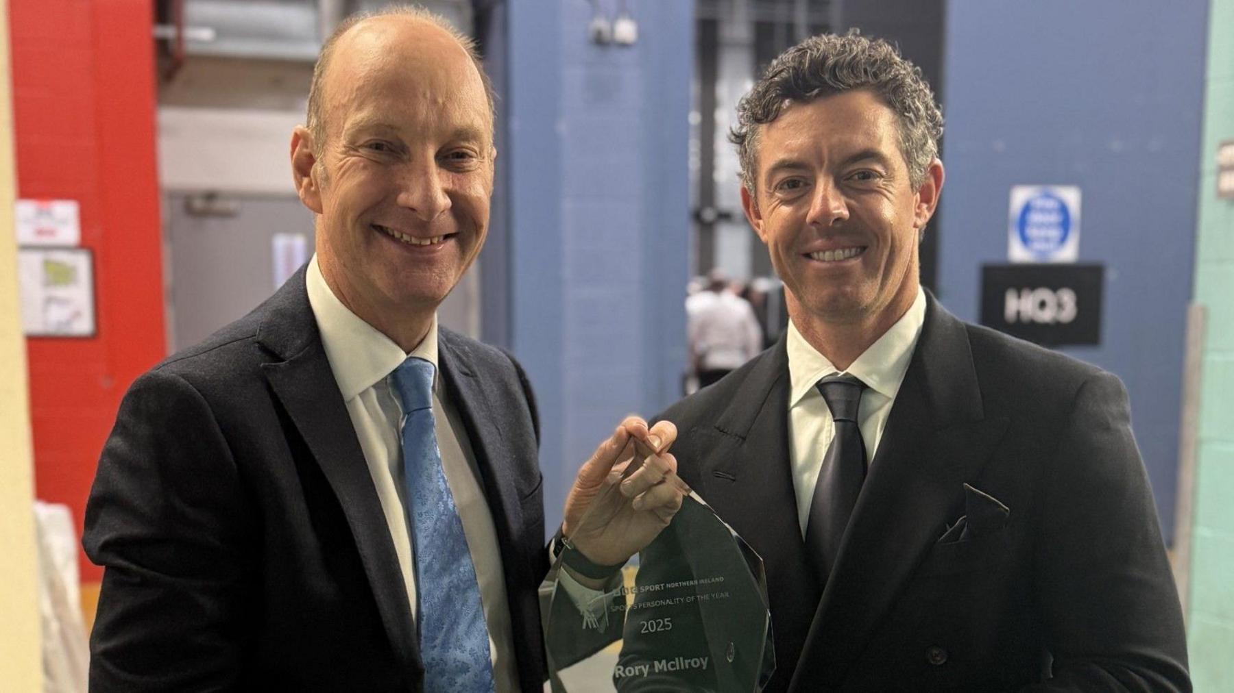 Stephen Watson presents the BBC NI Sports Personality of the Year award to Rory McIlroy