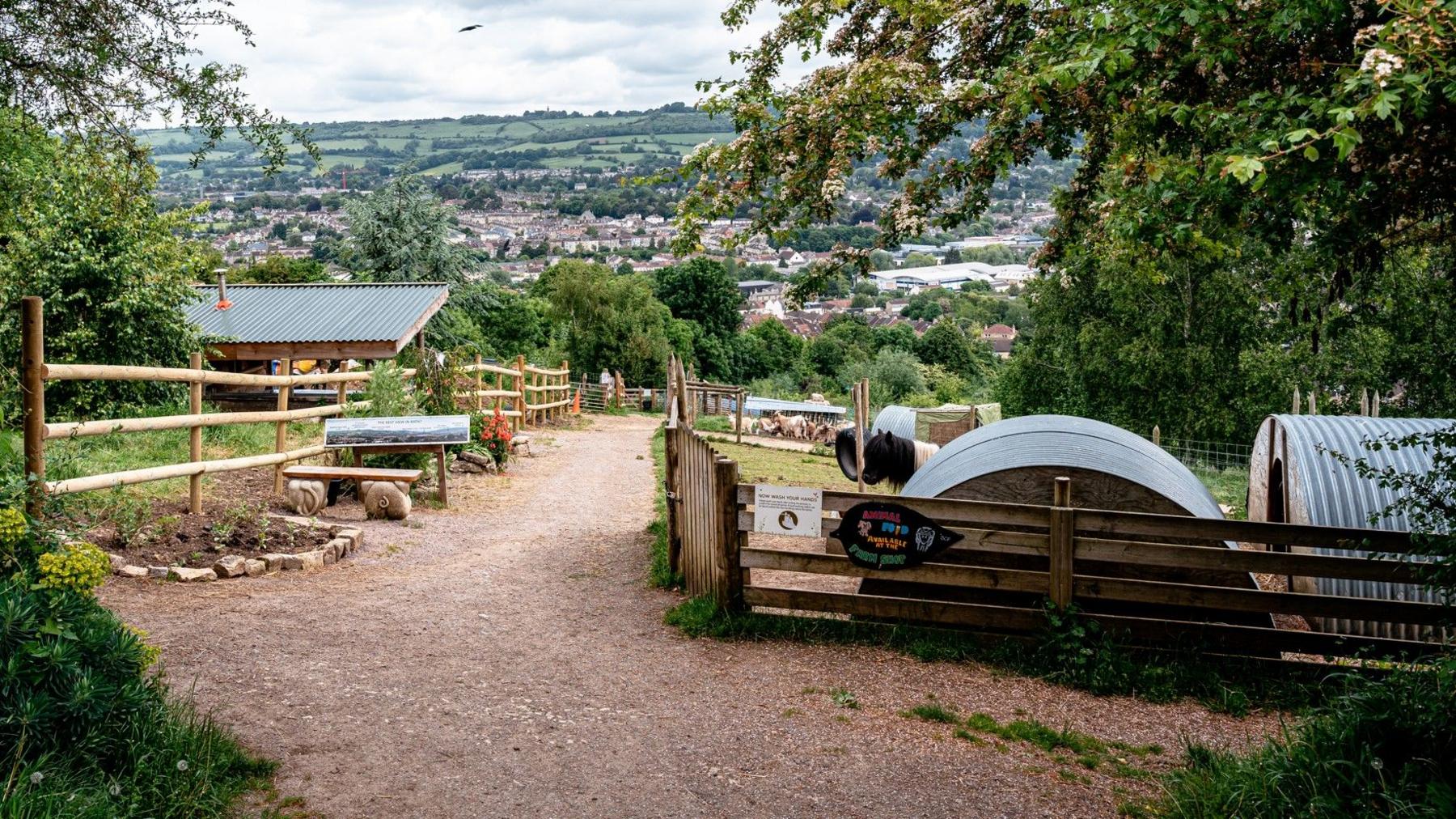 General view of Bath City Farm, with the city of Bath in background