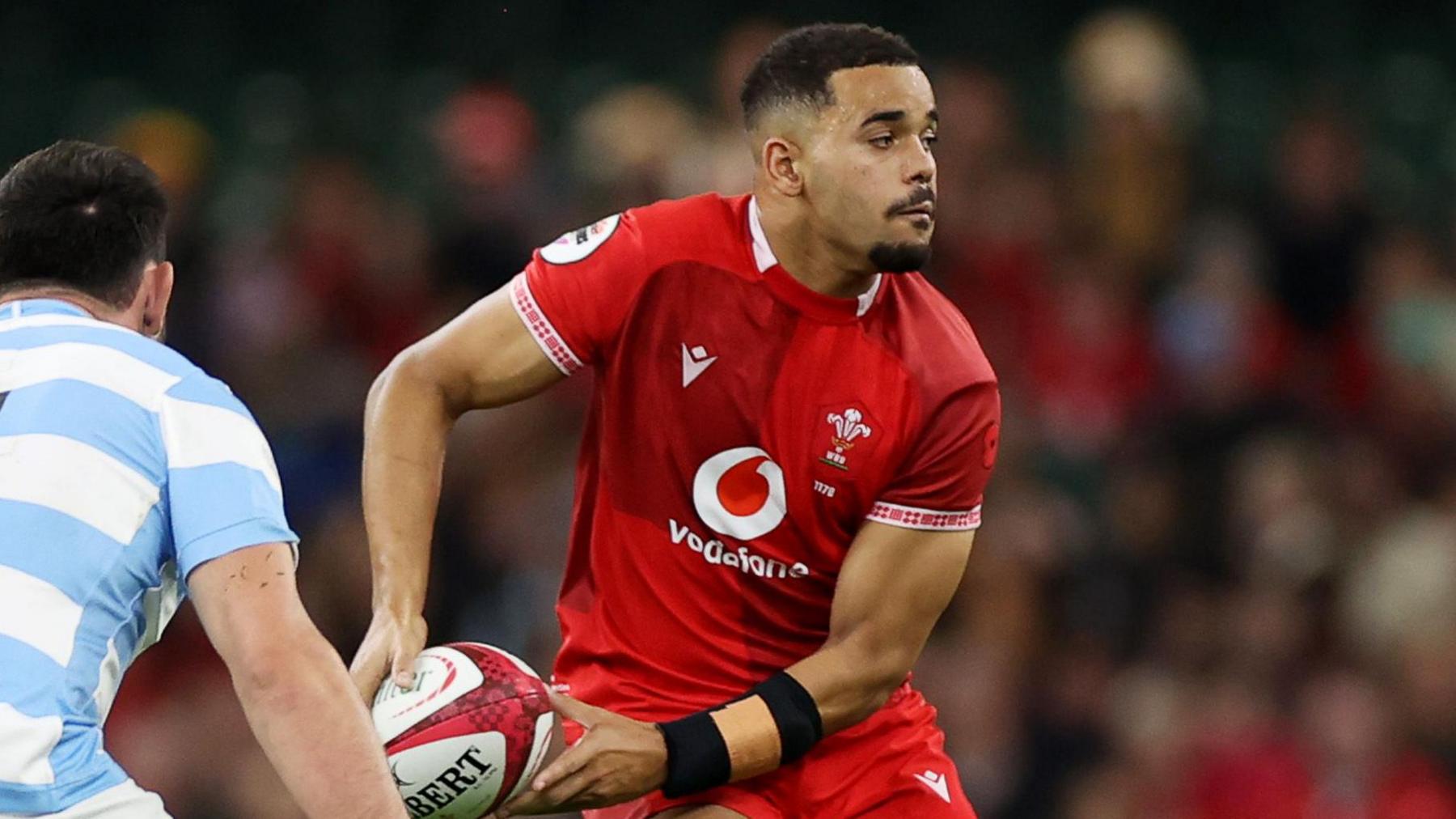 Ben Thomas passes the ball for Wales in their autumn Test against Argentina