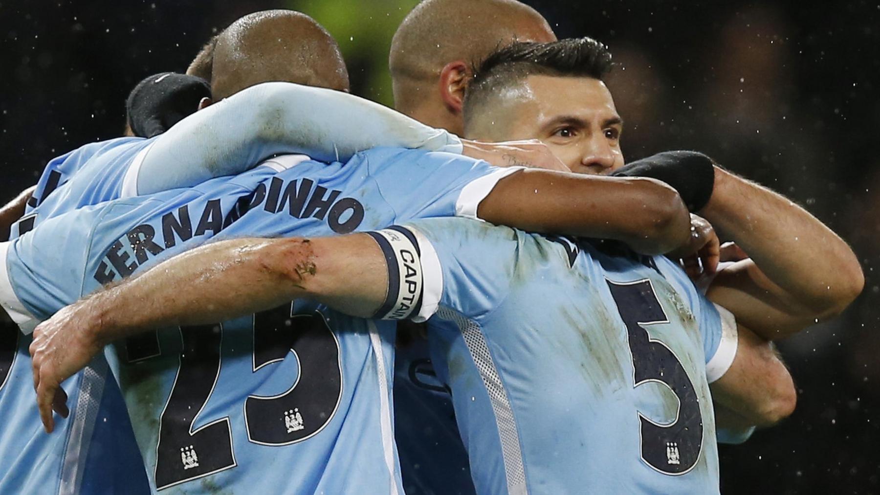 Manchester City players celebrate Sergio Aguero's goal