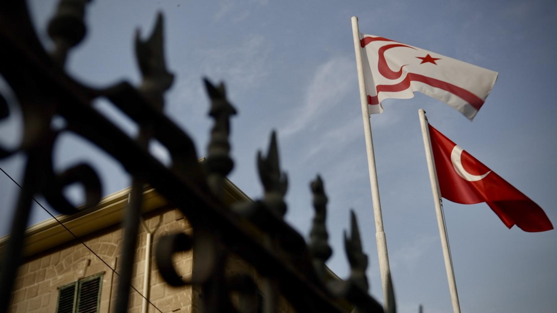 A street with the flags of northern Cyprus and Turkey flying alongside each other