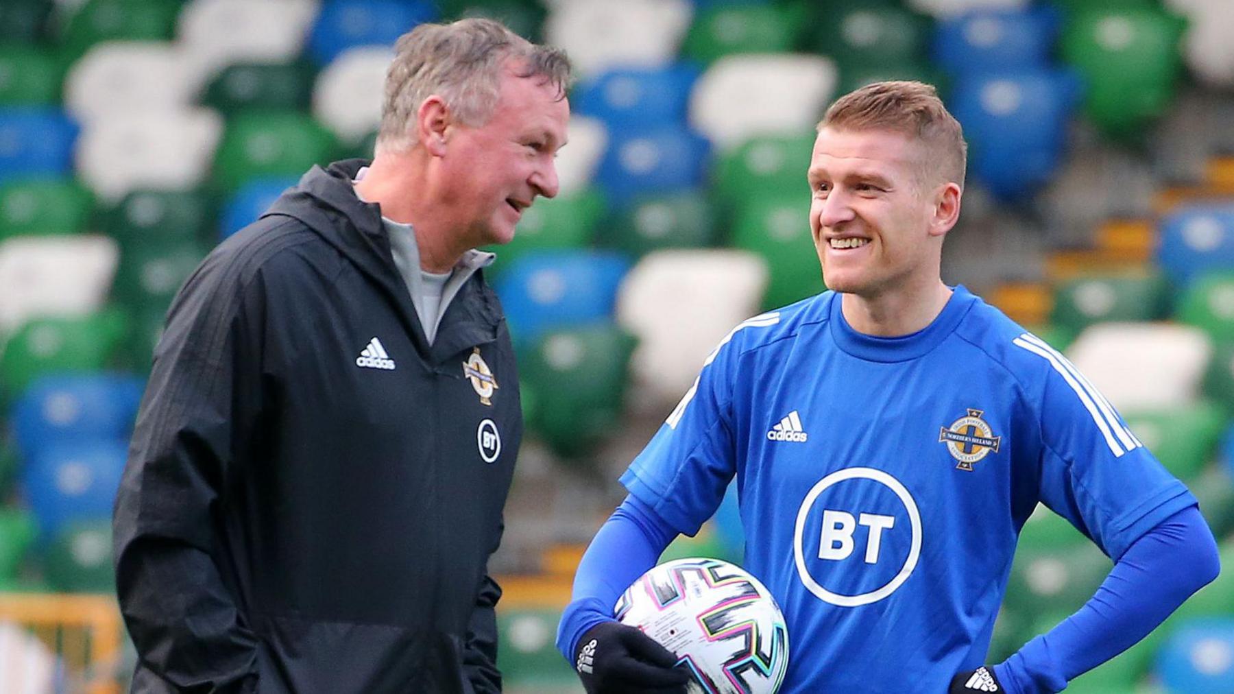 NI manager Michael O'Neill with Steven Davis