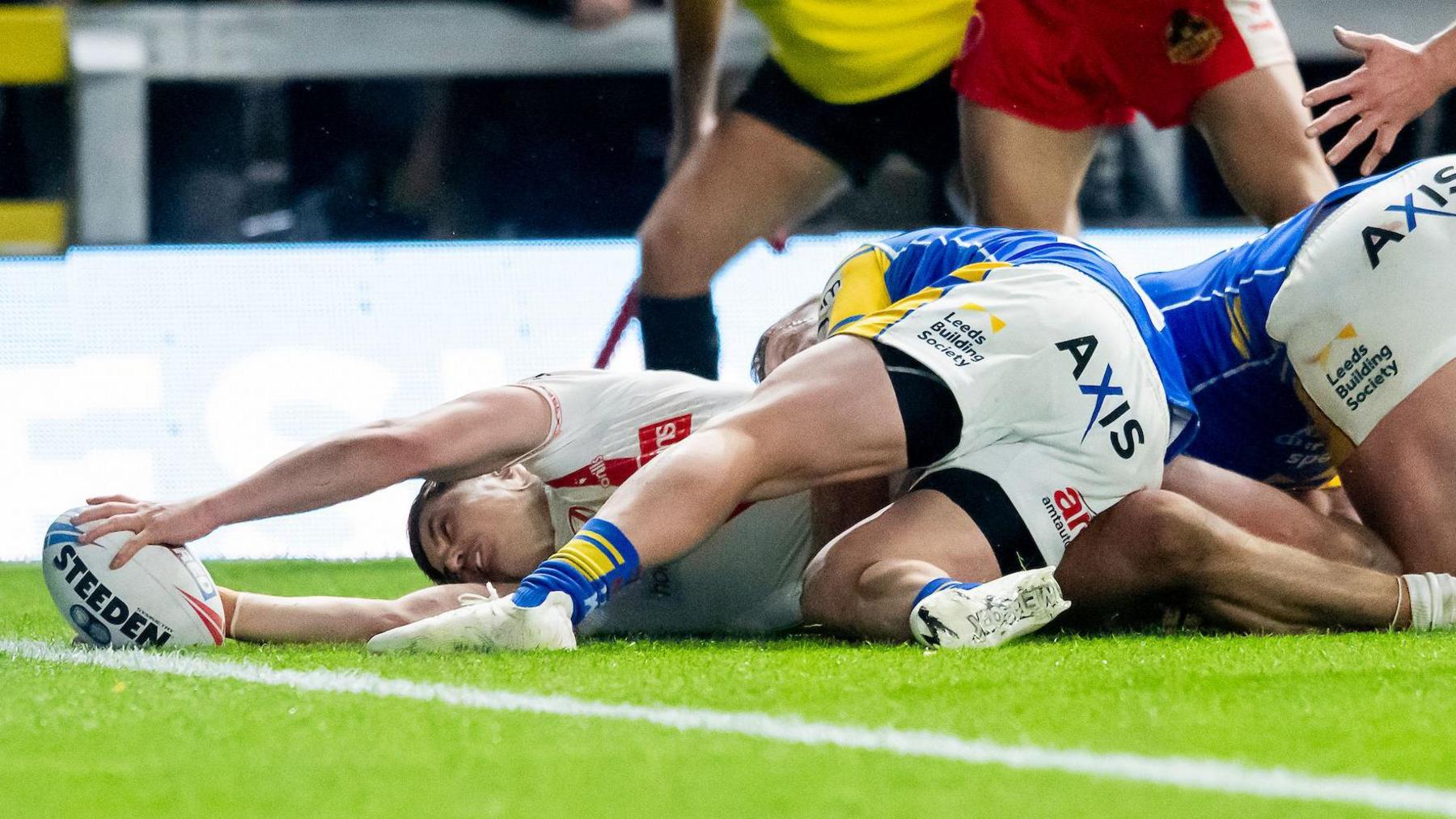 Jon Bennison reaches out to the tryline for St Helens