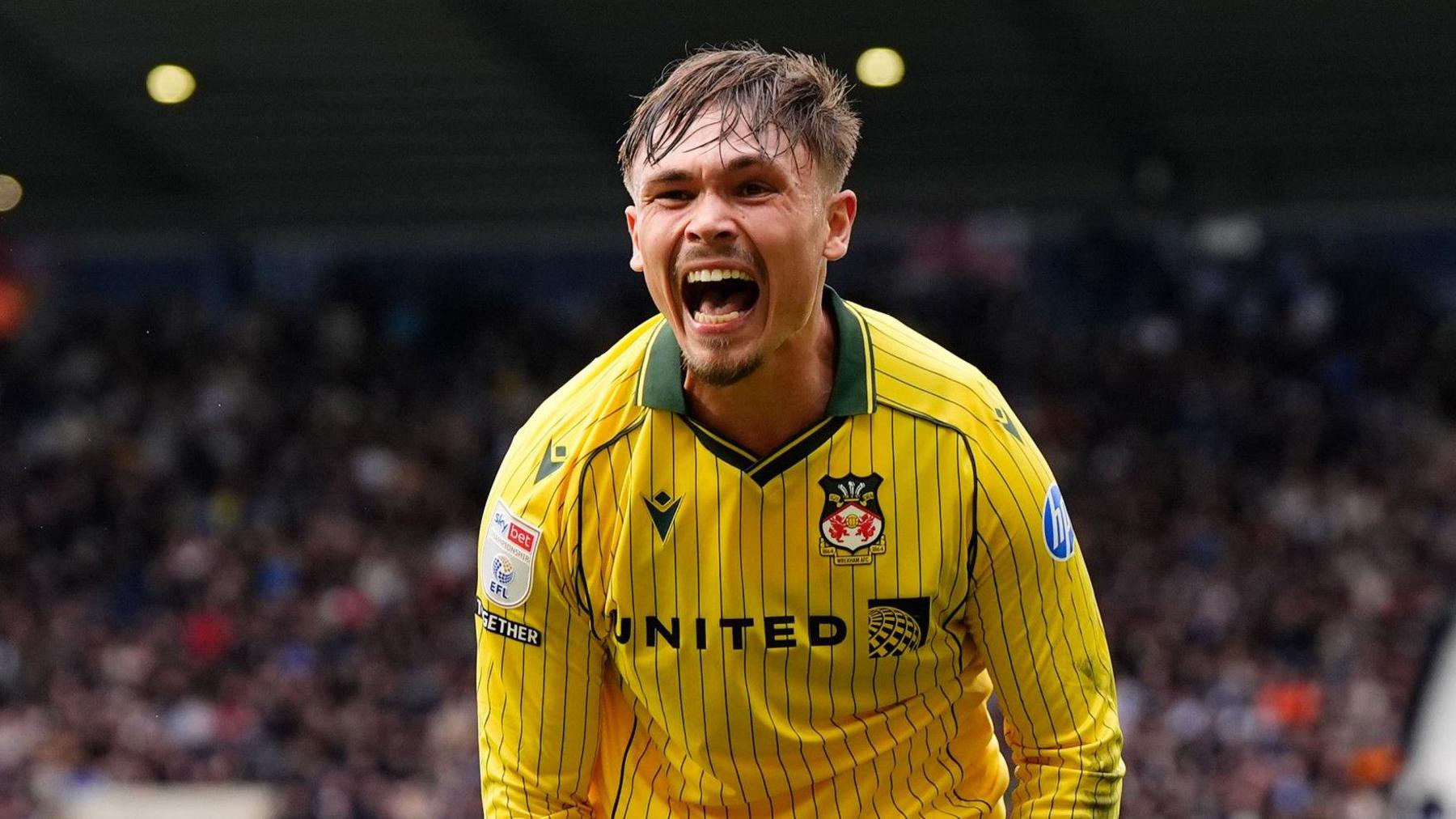 Wrexham's Callum Doyle celebrates