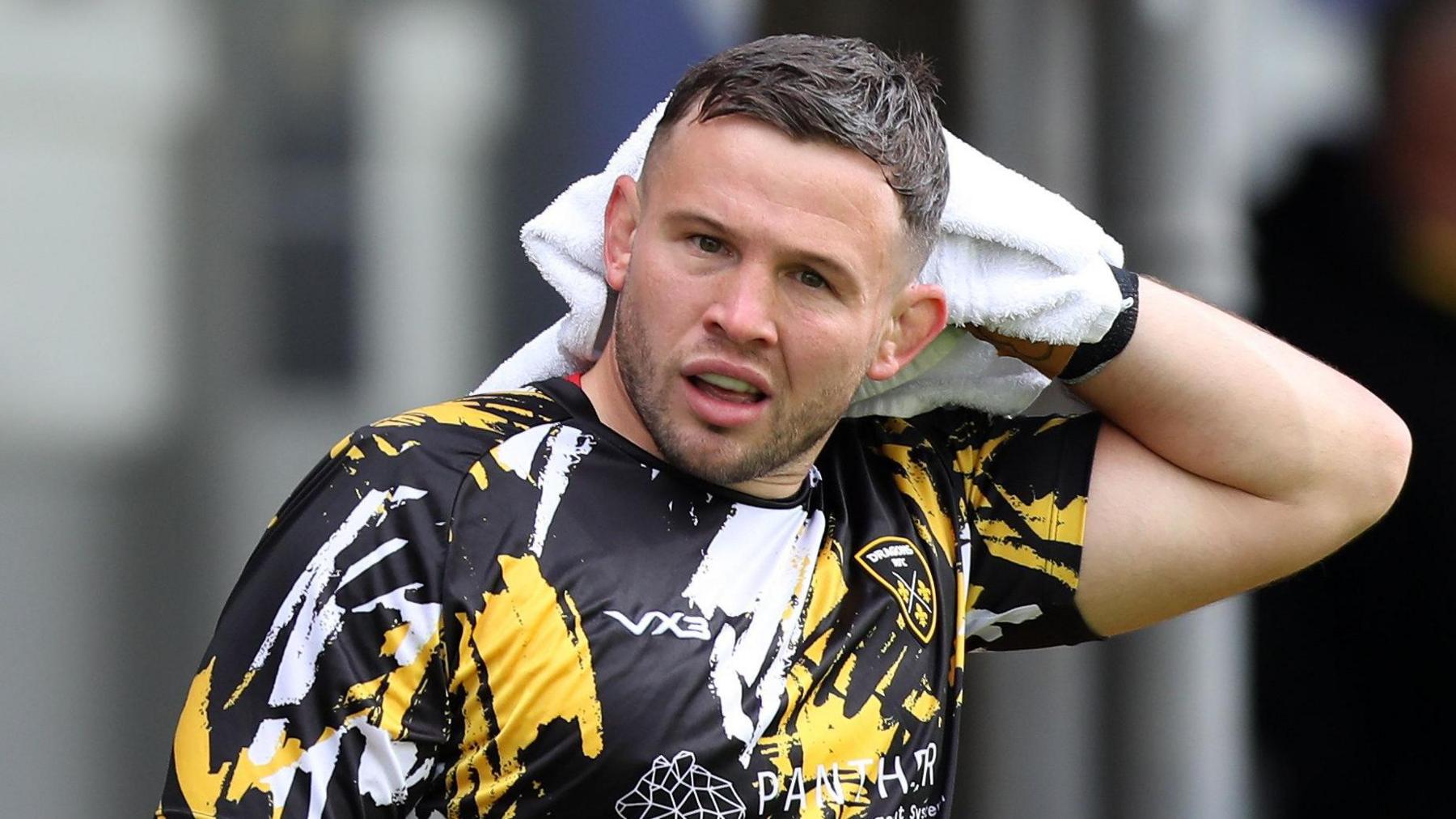 Elliot Dee during Dragons' warm-up at Rodney Parade