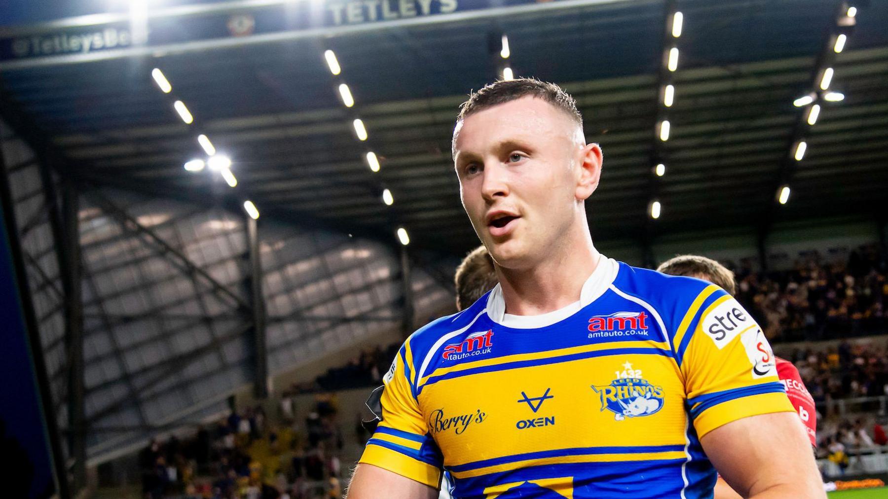 Harry Newman celebrates at the end of a Leeds Rhinos game in 2025