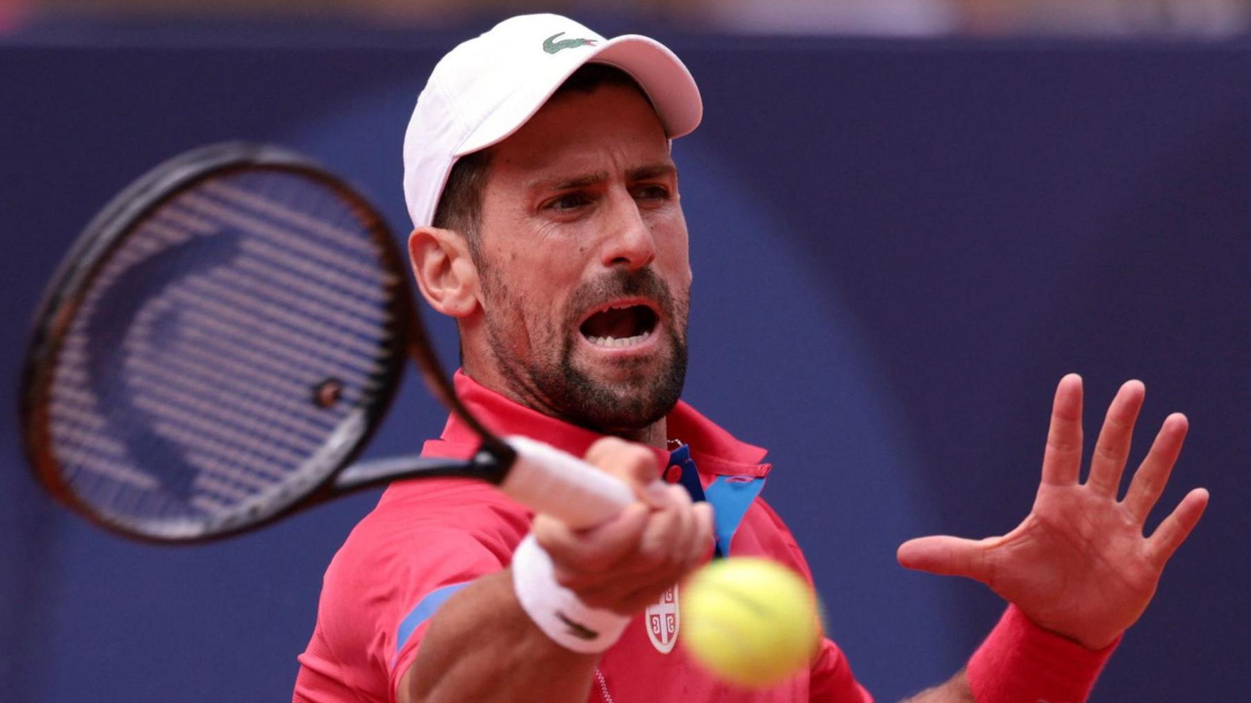 Novak Djokovic plays a shot during the 2024 Paris Olympics